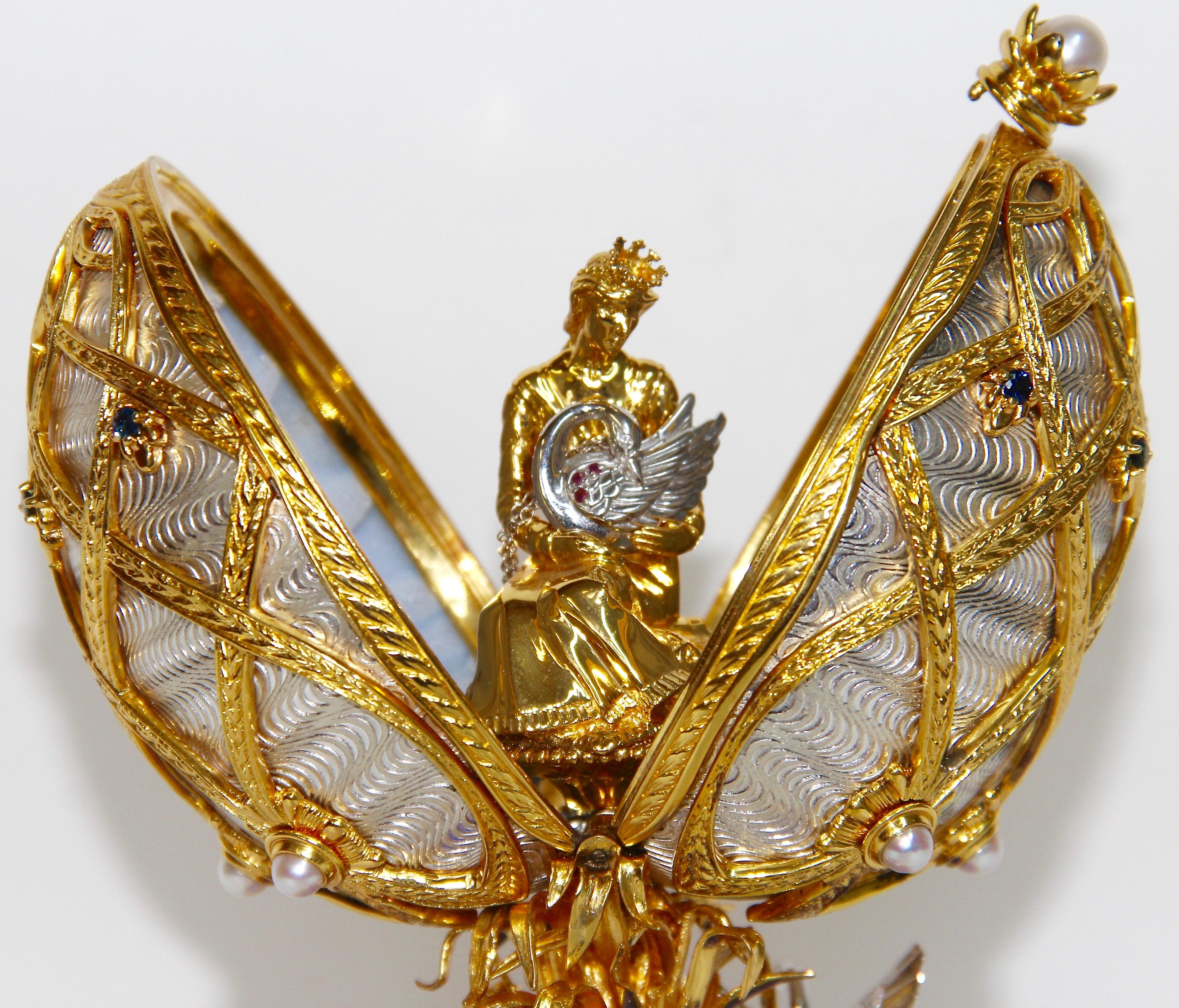 Extremely rare collector and lover object. This model was produced in a tiny number and only for selected customers.

Franklin Mint FABERGE SWAN LAKE IMPERIAL JEWELED MUSICAL Egg 

24K Gold Plated & Sterling Silver. 

An entrancing artistic