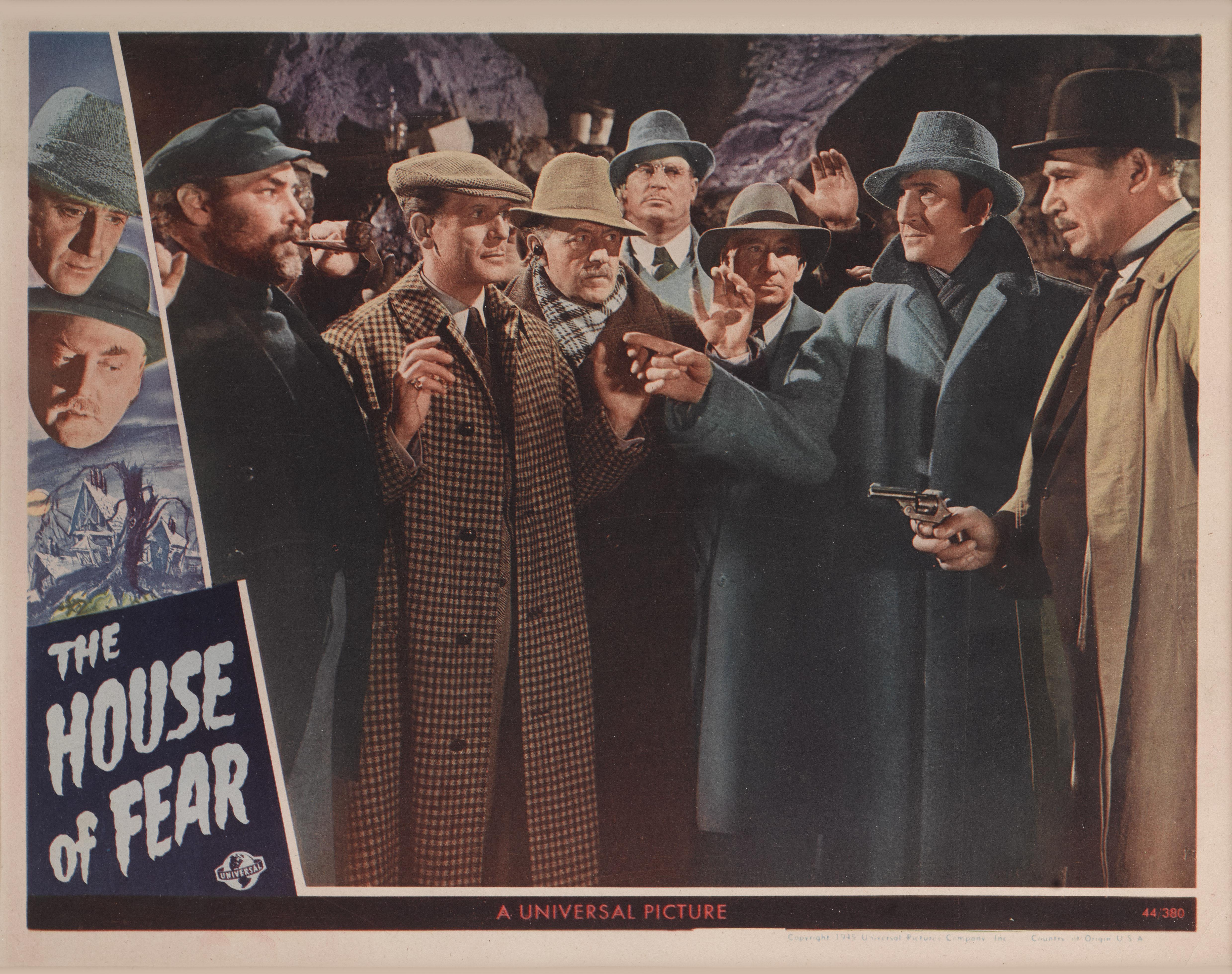 Original US lobby card for the 1945 Film Noir Mystery House of Fear.
This film starred Basil Rathbone as Sherlock Holmes and Nigel Bruce as Doctor Watson.
The film was directed by Roy William Neill.
This lobby card is conservation framed with UV