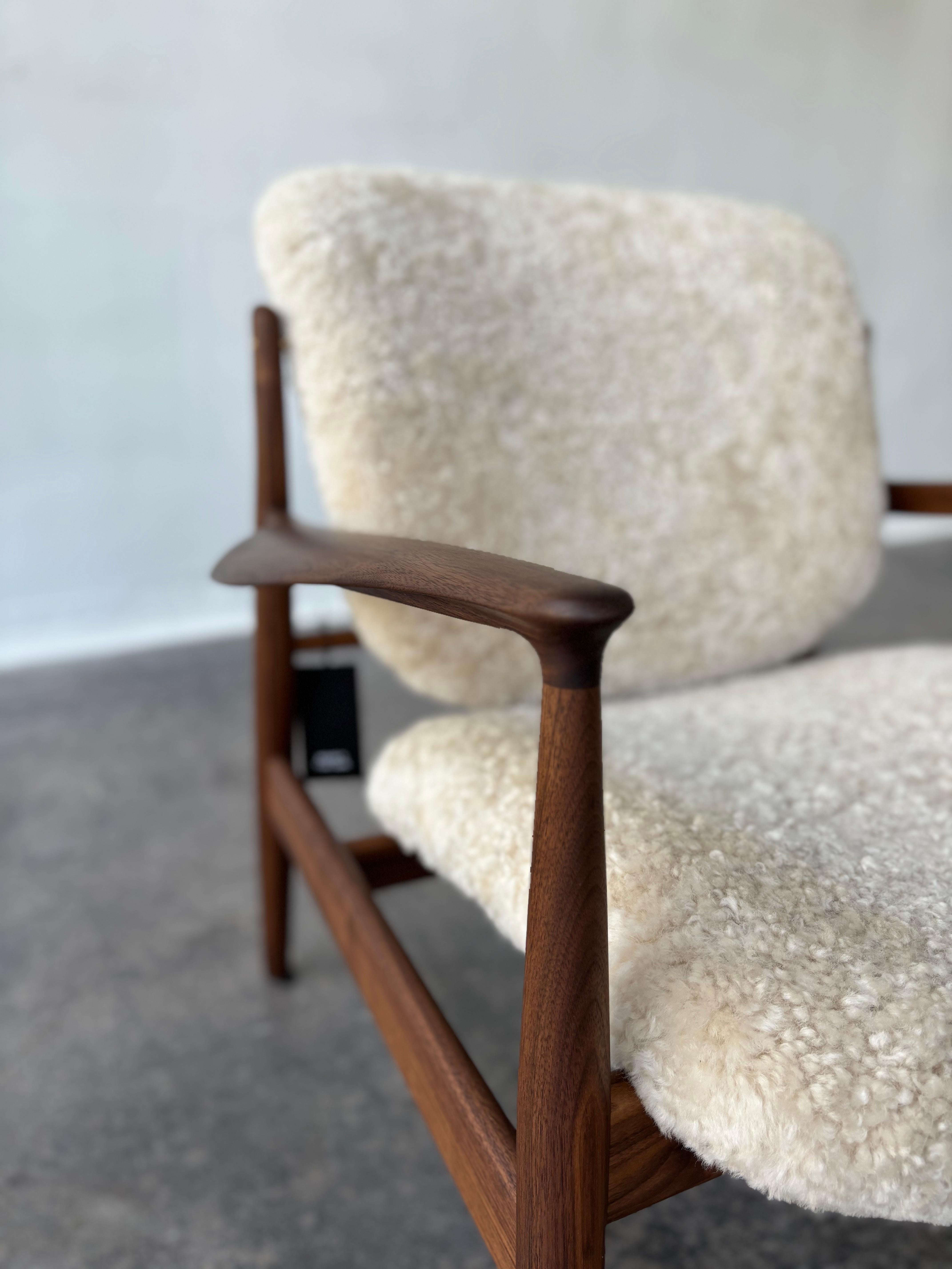 House of Finn Juhl France Chair, Walnut with Shearling In Excellent Condition In Miami, FL