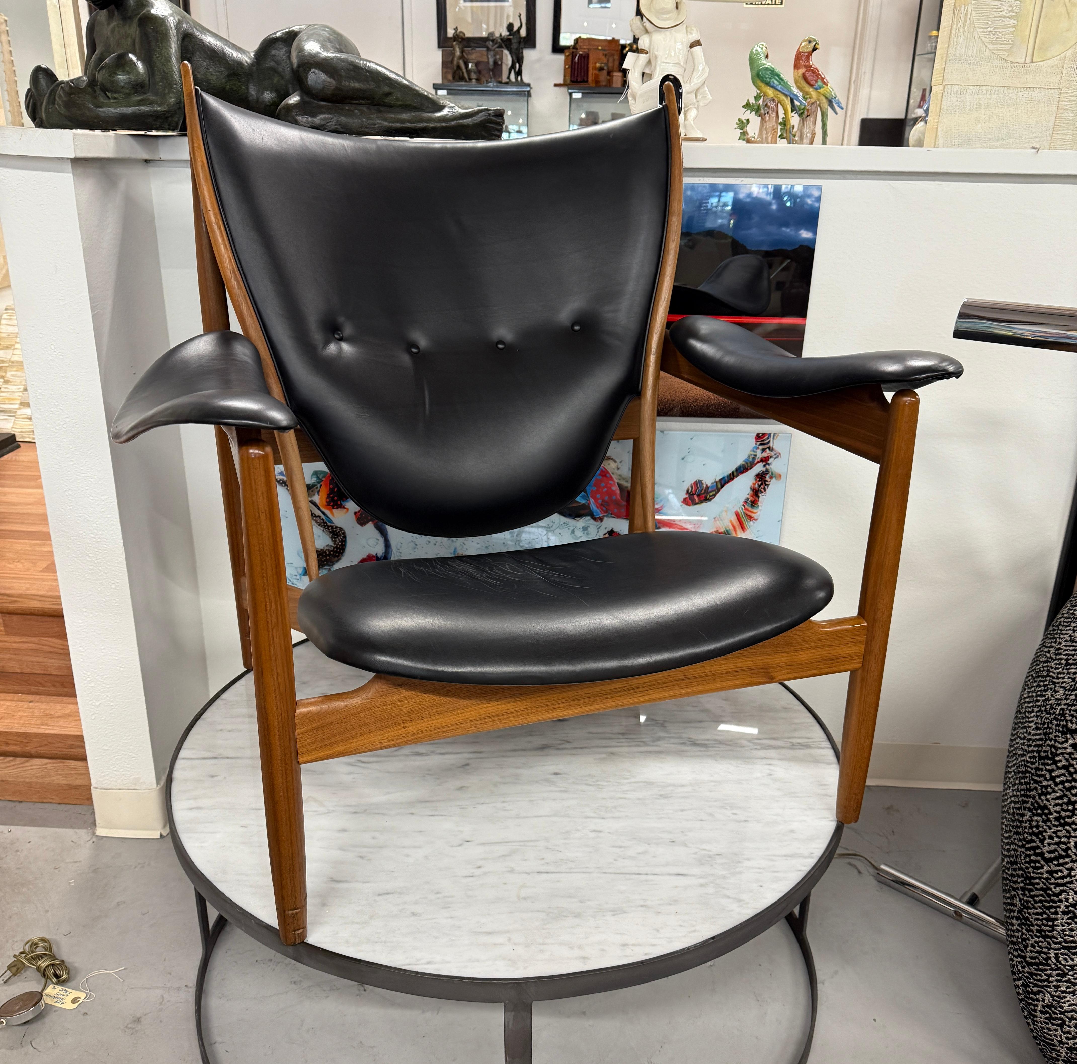 A Beautiful Classic design by Finn Juhl this Chieftains chair is extremely comfortable  as well as being as wonderful sculptural object. 
This example bears the House of Finn Juhl One Collection tag underneath which dates it to post 2002 when they