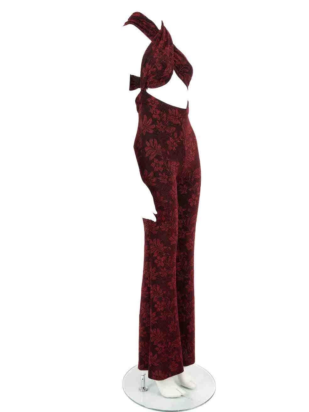 CONDITION is Very good. Minimal wear to jumpsuit is evident. Minimal wear to both legs with plucks to the metallic weave on this used House of Harlow 1960 x Revolve designer resale item.
 
 
 
 Details
 
 
 House of Harlow 1960 x Revolve
 
 Red