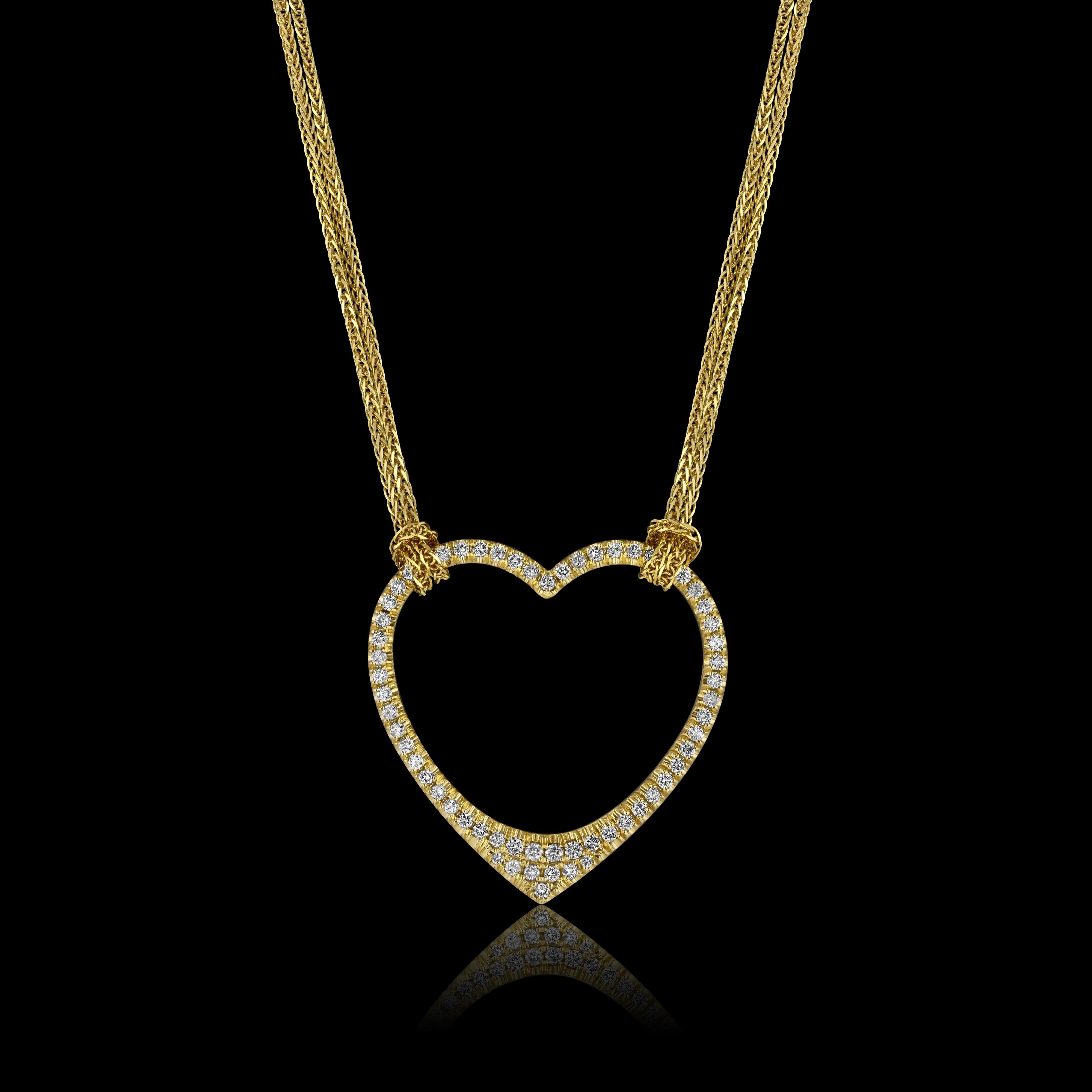 Pendentif en forme de cœur en or jaune 10k, sculpté à la main, de la House of Diamonds Collectional. 

Comprend 66 diamants (1,31ct) et une chaîne de 18