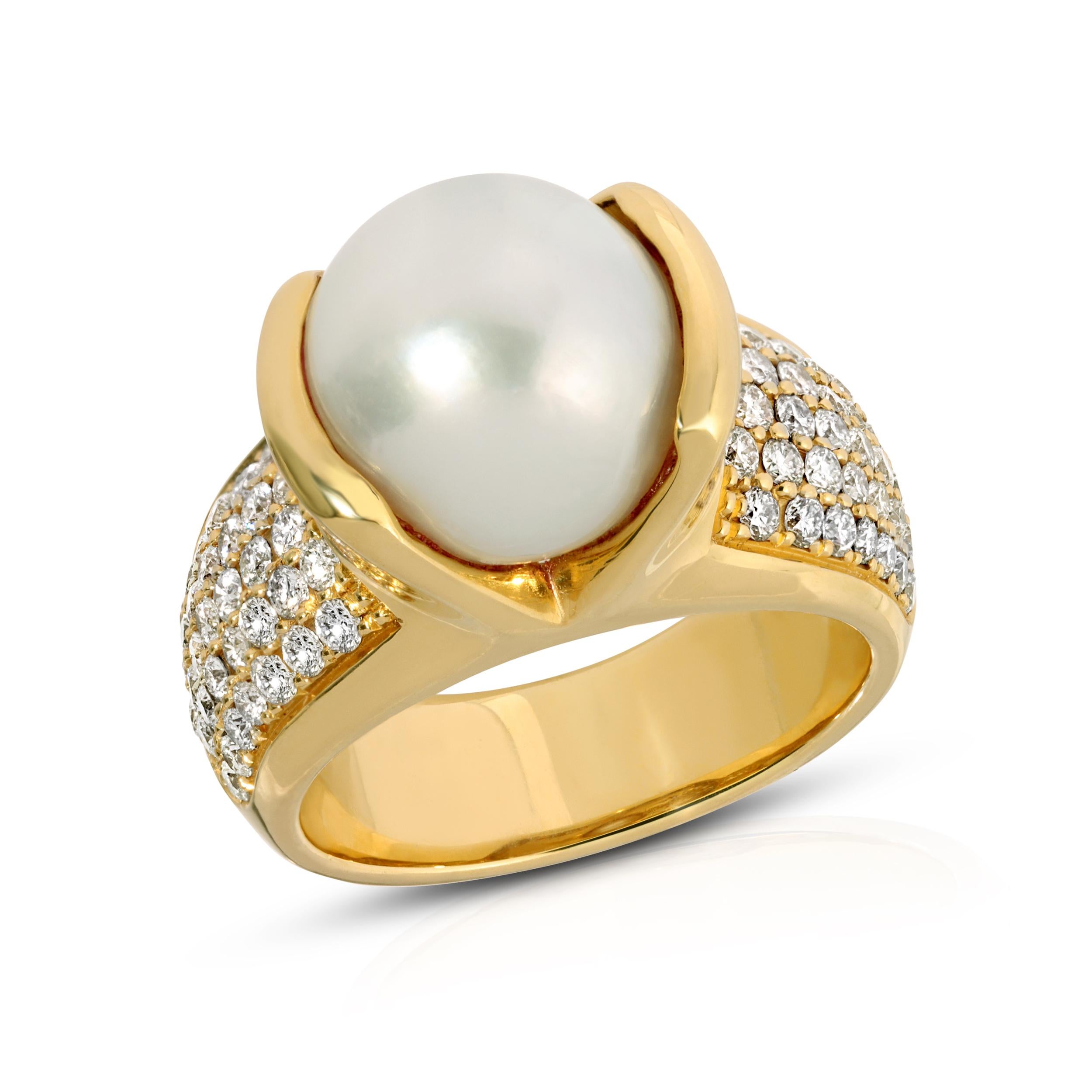 14k yellow gold open bezel ring, with cultured pearl and diamond shoulders.

House of RAVN hand carved BELLA statement ring. This unique open bezel white cultured pearl ring with packed diamond shoulders is an elegant show stopper. 