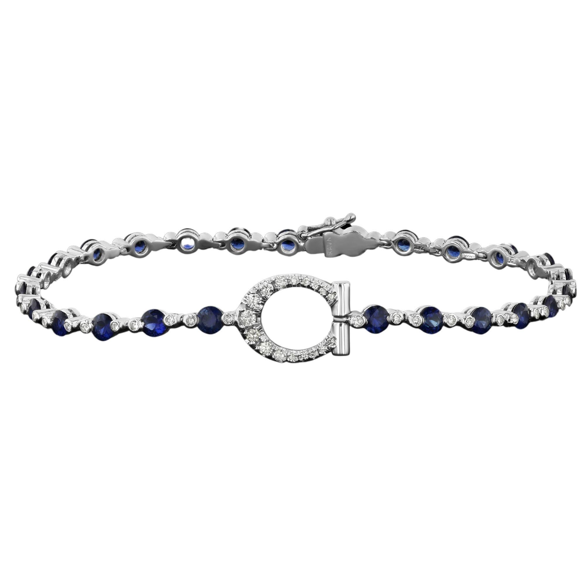 Material: 18k White Gold

Stone: Diamond and Sapphire

Carats: 3.5ct sapphire and 1.3ct diamond carat weight