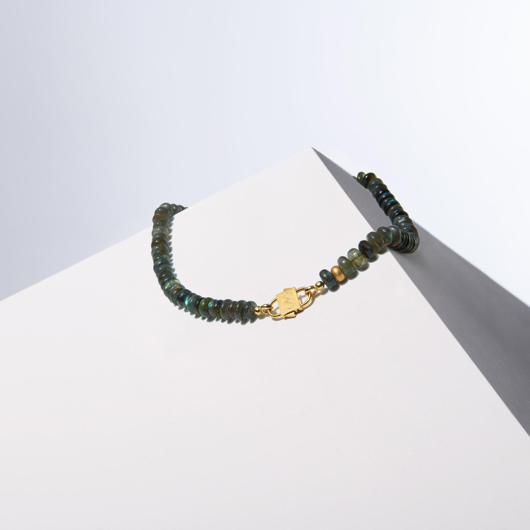 - The necklace showcases the enchanting beauty of Labradorite, a gemstone famed for its mesmerizing labradorescence, which casts an ethereal blue sheen reminiscent of a celestial universe
- Each Labradorite bead is meticulously shaped to a