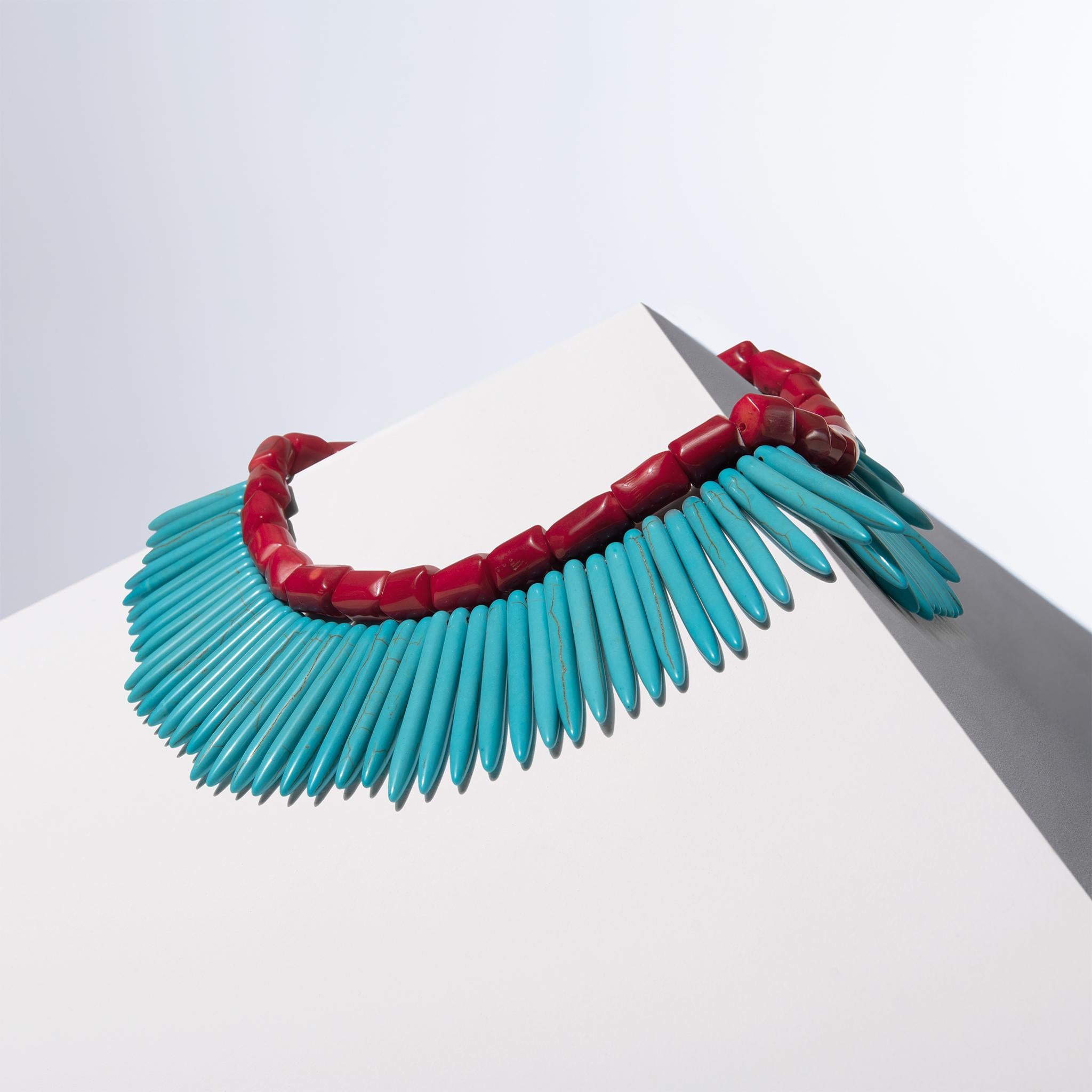 - This set features two distinct necklaces, one with red corals and the other with Blue Howlite, offering versatility to mix and match for varied styling options.
- The White Coral row measures 40 cm/ 15.7 inch and weighs 120g, while the Black