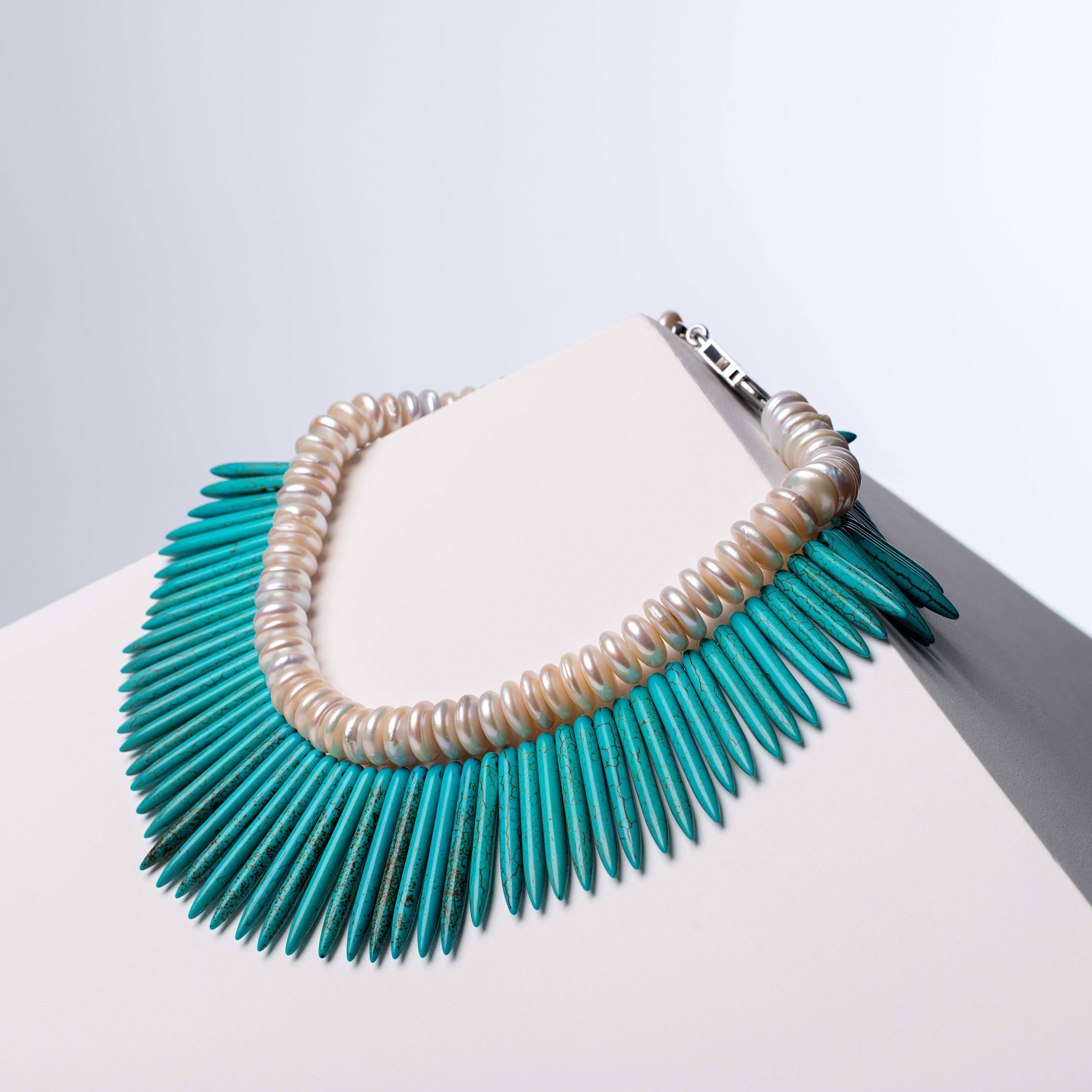 - Two distinct necklaces in one set — a Rondelle Pearl necklace and a spike cut Turquoise Howlite necklace, offering versatile wear and combination possibilities.
- Rondelle Pearl row measuring 40 cm and weighing 120g, paired with a Turquoise