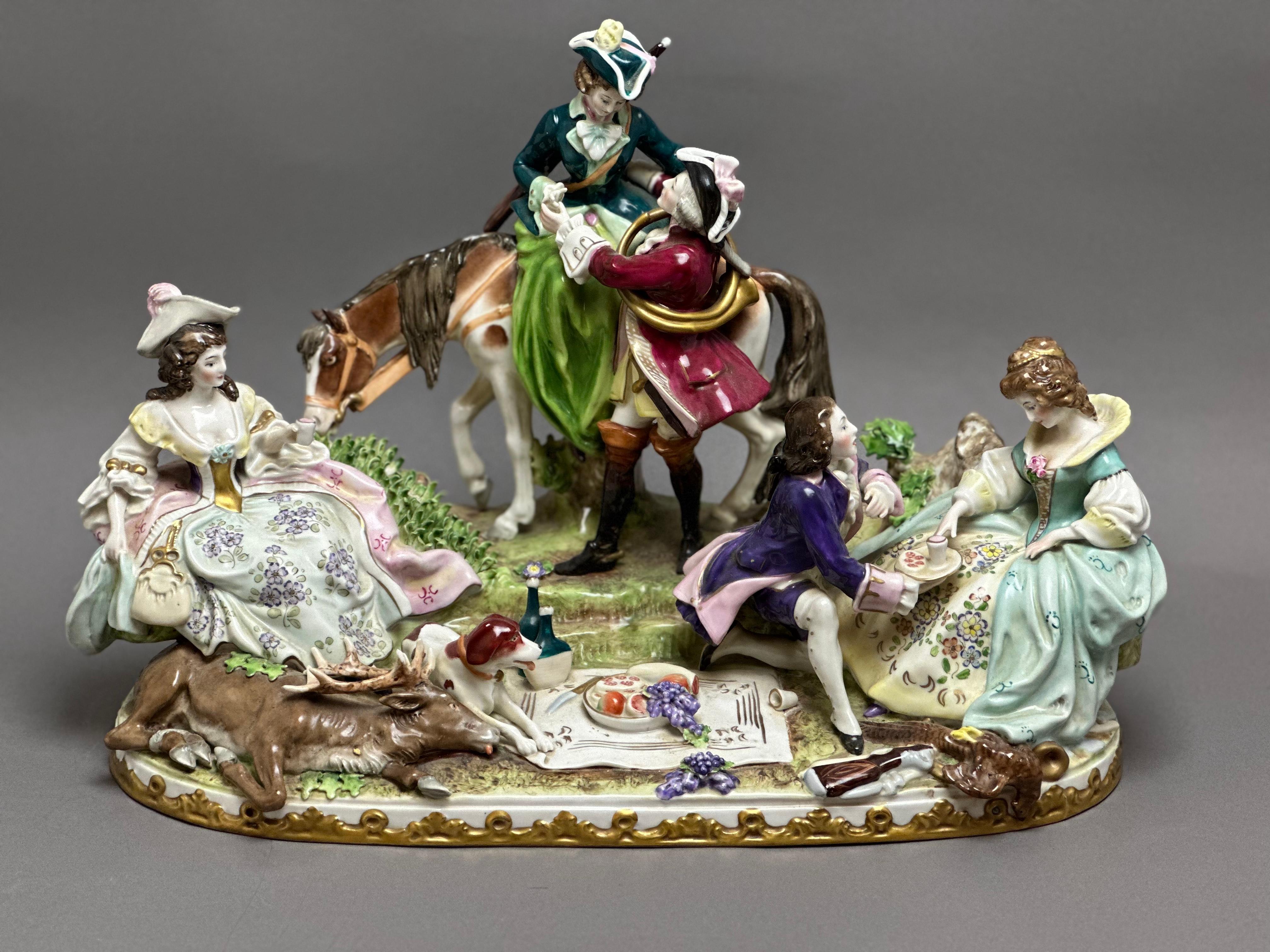 House of Scheibe Alsbach founded in 1835. The porcelain figures are manufactured in Germany, before 1989. The figures are a two love couple and a women at the 'hunting scene in circa 1750. The figure is handmade from porcelain and painted in many