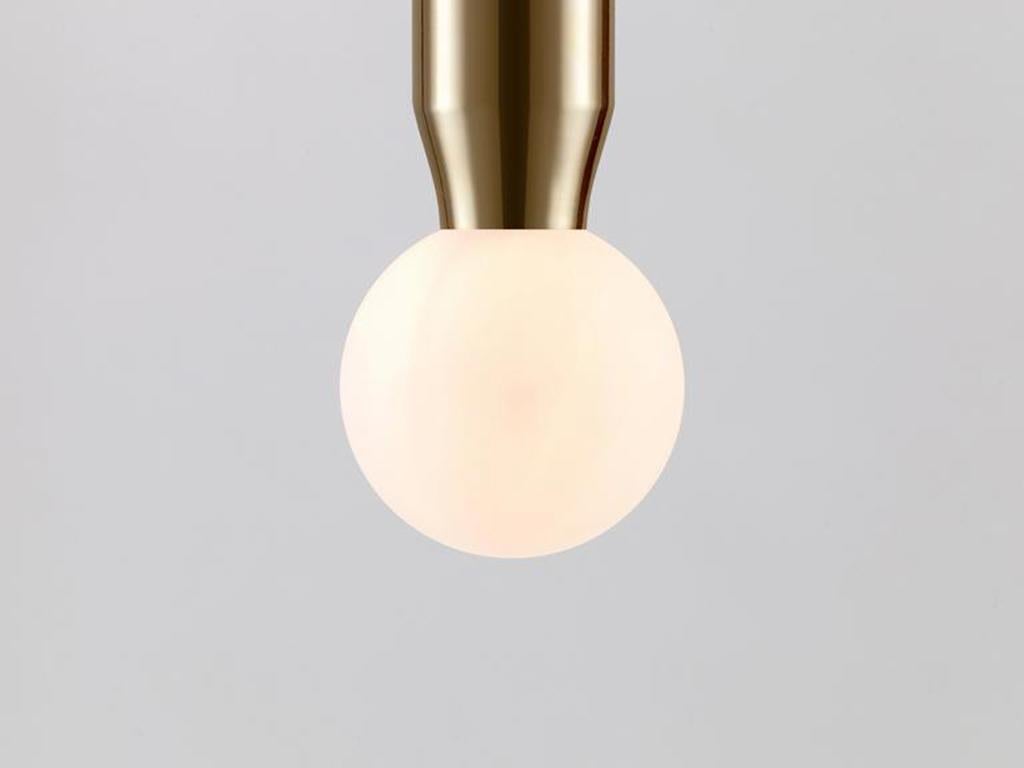This versatile pendant light is a simple and elegant statement. The metal body holds an oversized glass opal ball, which diffuses a warm illuminating glow. Ideal for a dining space or bedroom. Single-piece pressed metal body. 2 year guarantee. Rich