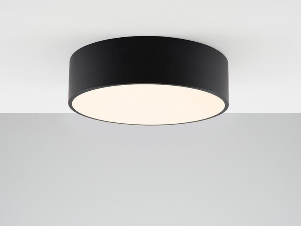 This low profile flush fit ceiling light is perfect for low ceilings. The circular metal frame encloses an integrated LED bulb and flat opal acrylic shade, which diffuses a wide bright light. Ideal for a kitchen or utility space. Or pitch nearly
