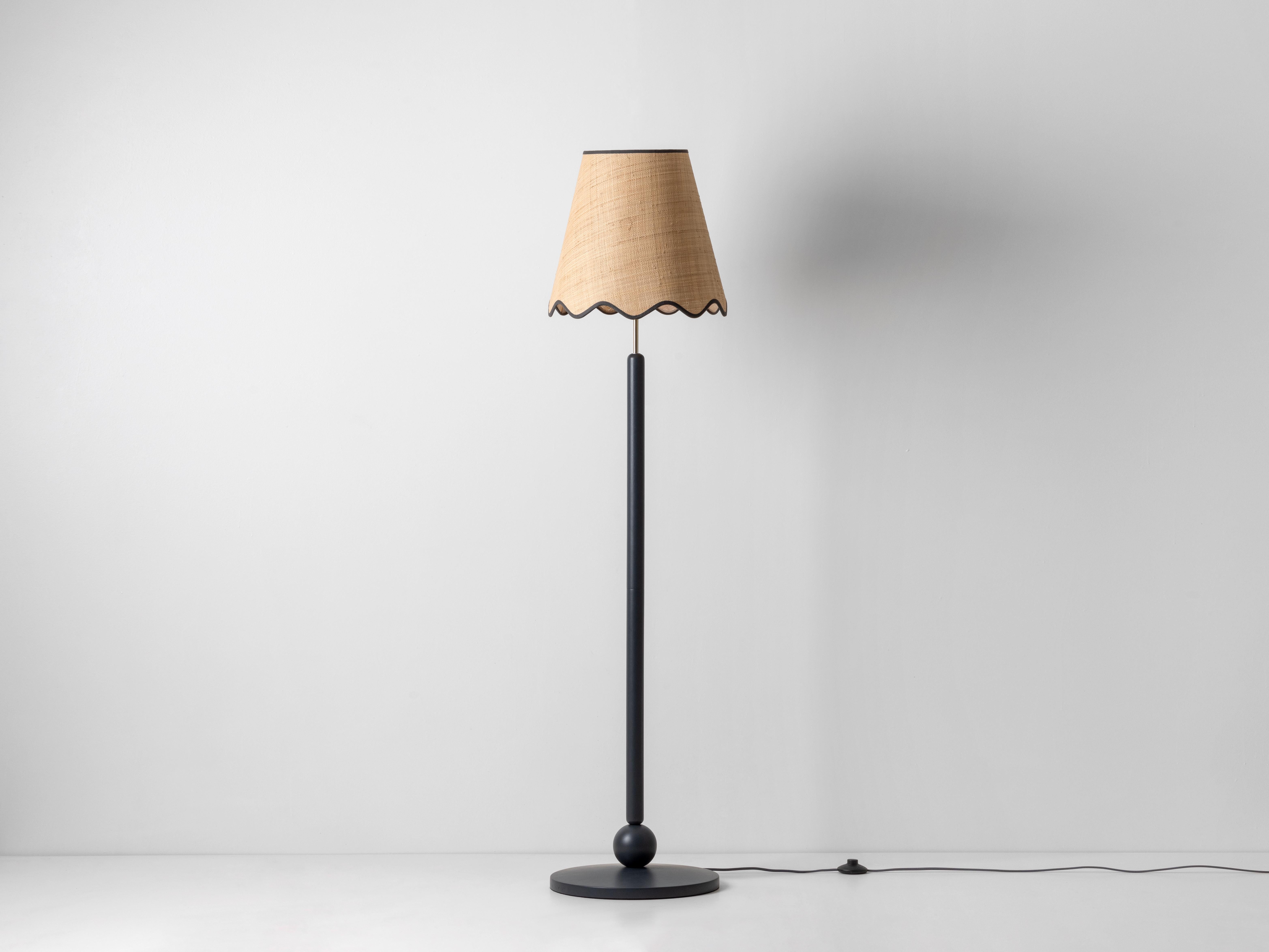 Using traditional materials and techniques, this turned wood lamp is the perfect way to add texture and warmth to your space. The wooden base has been painted in our signature Charcoal Grey, to perfectly complement and contrast against the natural