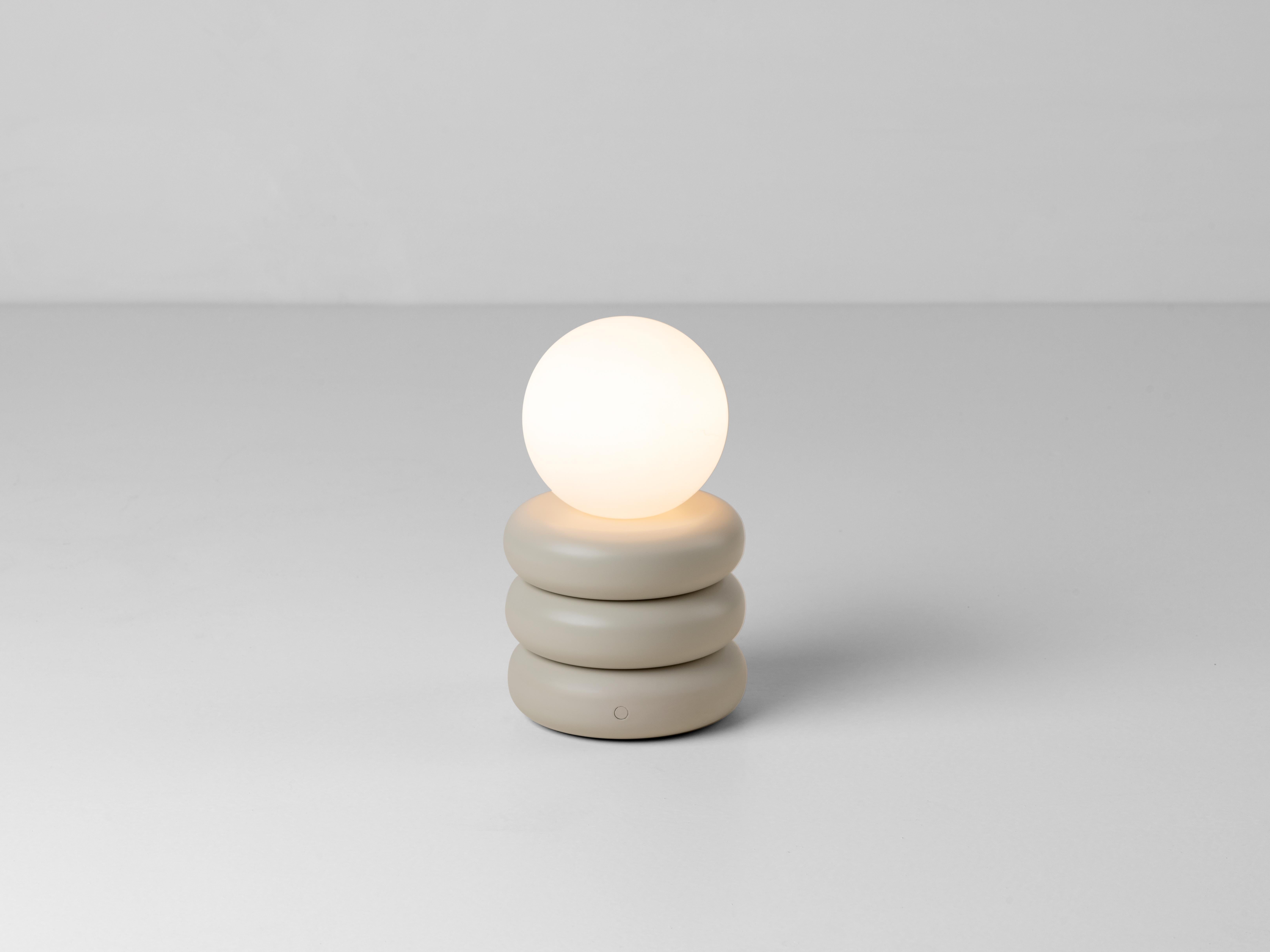 Stylish and fun, this little 'glow worm' is the perfect stylish desk lamp or bedside companion. Light up your interior and take it with you, as it's rechargeable battery means that you can move it around. With up to 7 hours charge time, the stacked