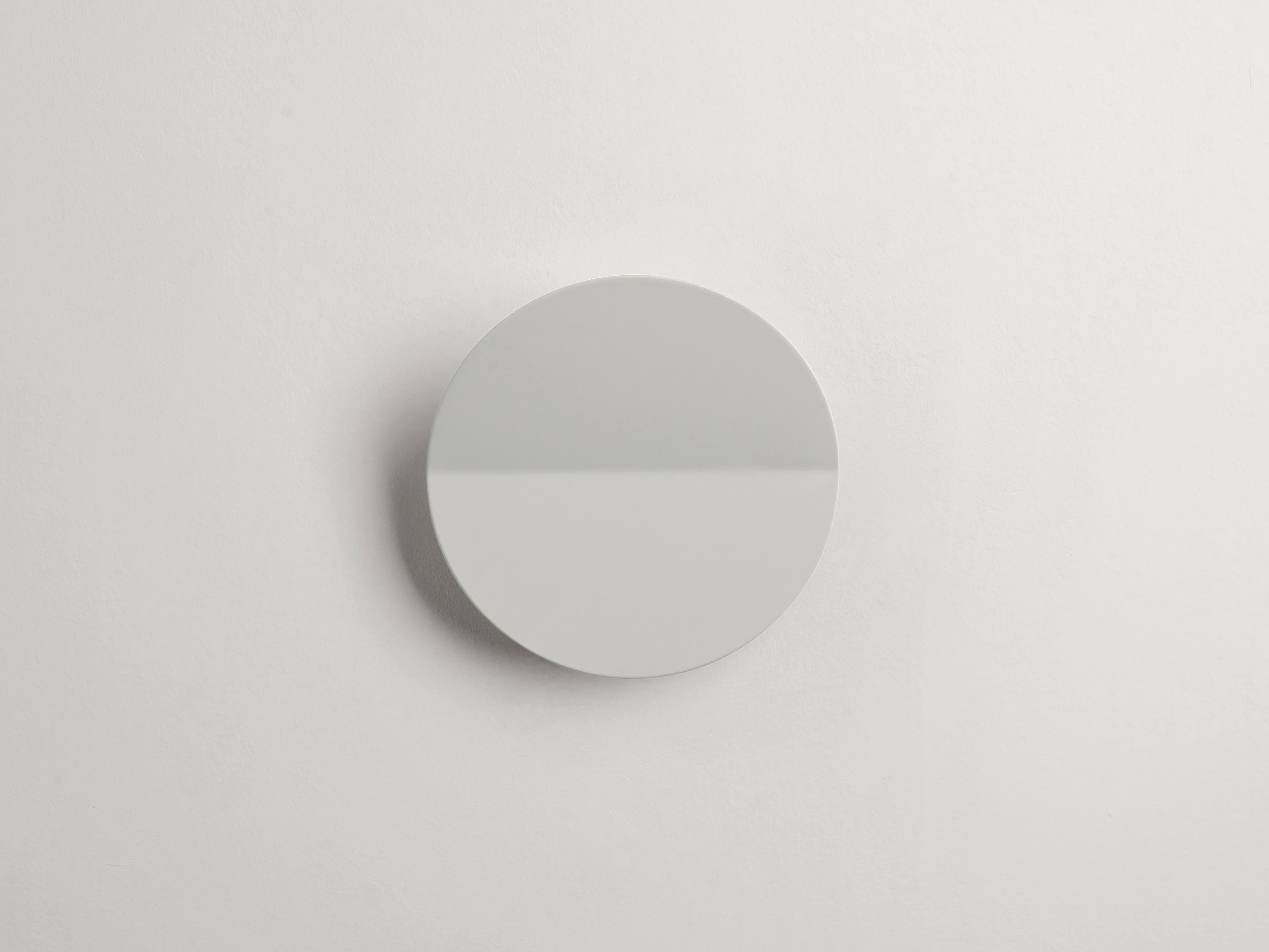 Create an ambient atmosphere in your home with our sand diffuser wall light. A subtle fold runs through the centre of this classic circular shade, enabling a focused light flow for a warm and welcoming effect. Even better, this fixture is an