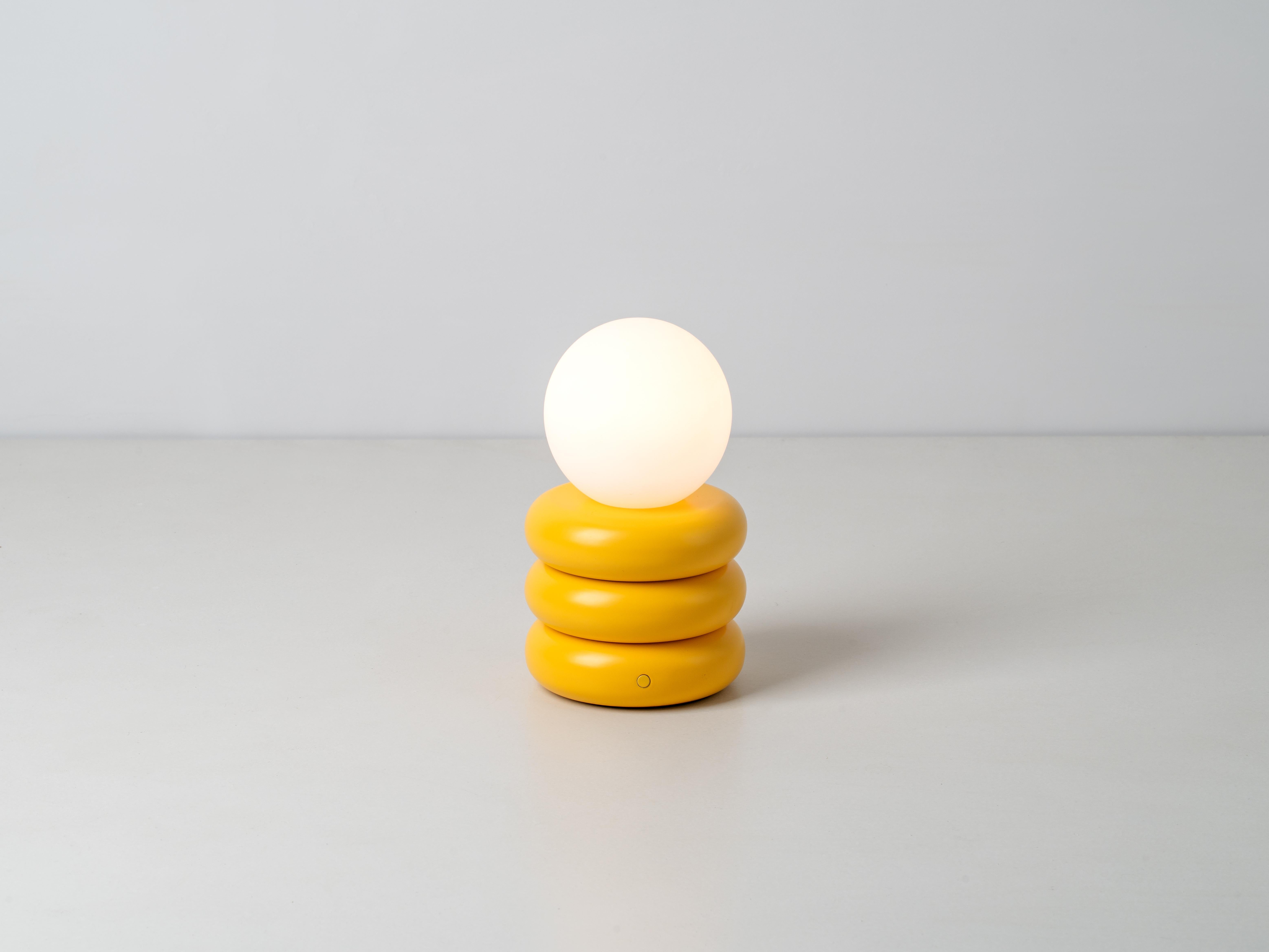 Stylish and fun, this little 'glow worm' is the perfect stylish desk lamp or bedside companion. Light up your interior and take it with you, as it's rechargeable battery means that you can move it around. With up to 7 hours charge time, the stacked