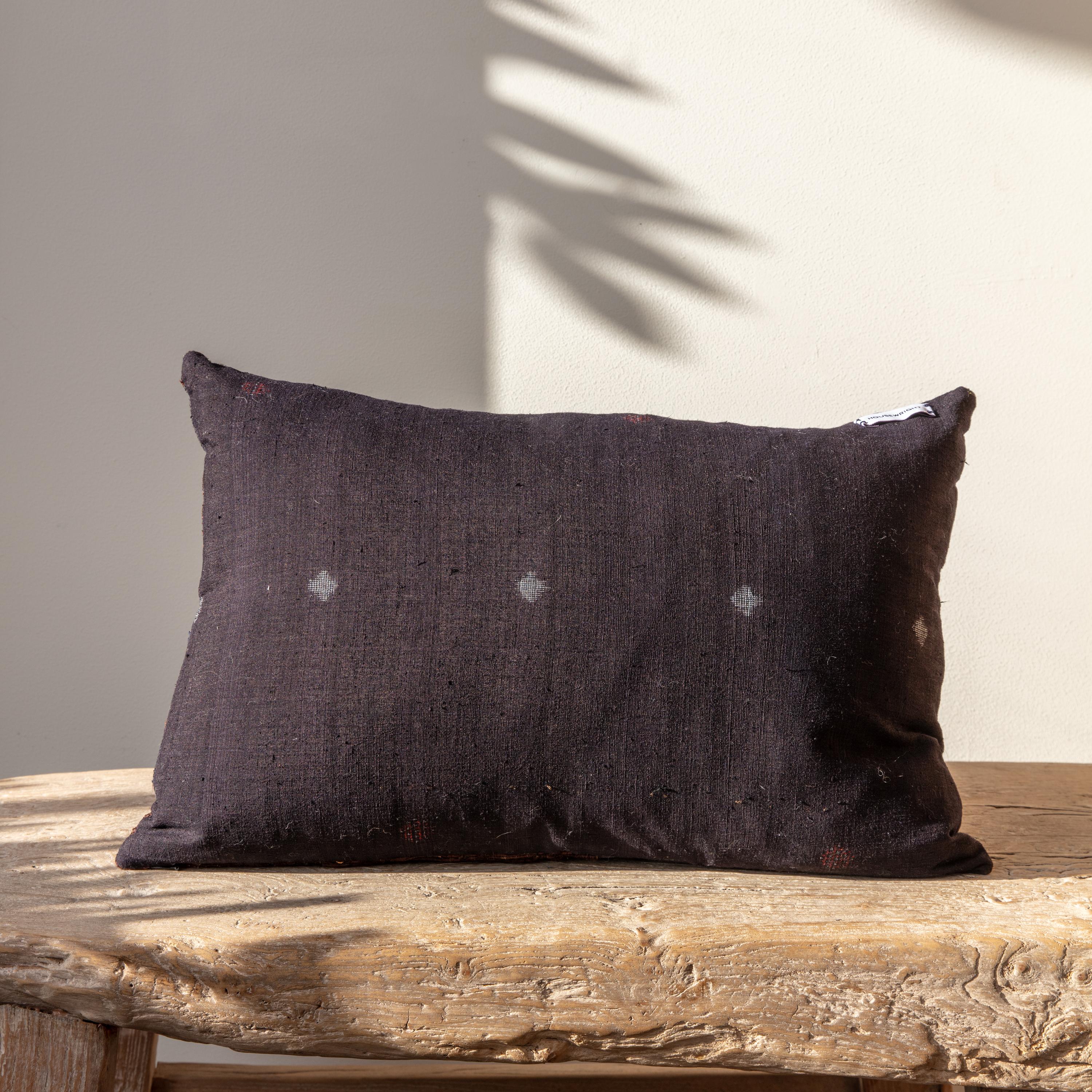 100% down fill, zipper closures.</p>
Dry-clean only.</p>
Handmade in Seattle, WA.</p>
Each one-of-a-kind pillow is handcrafted in the Pacific Northwest with unexpected details from hardware to seams and selvage.</p>