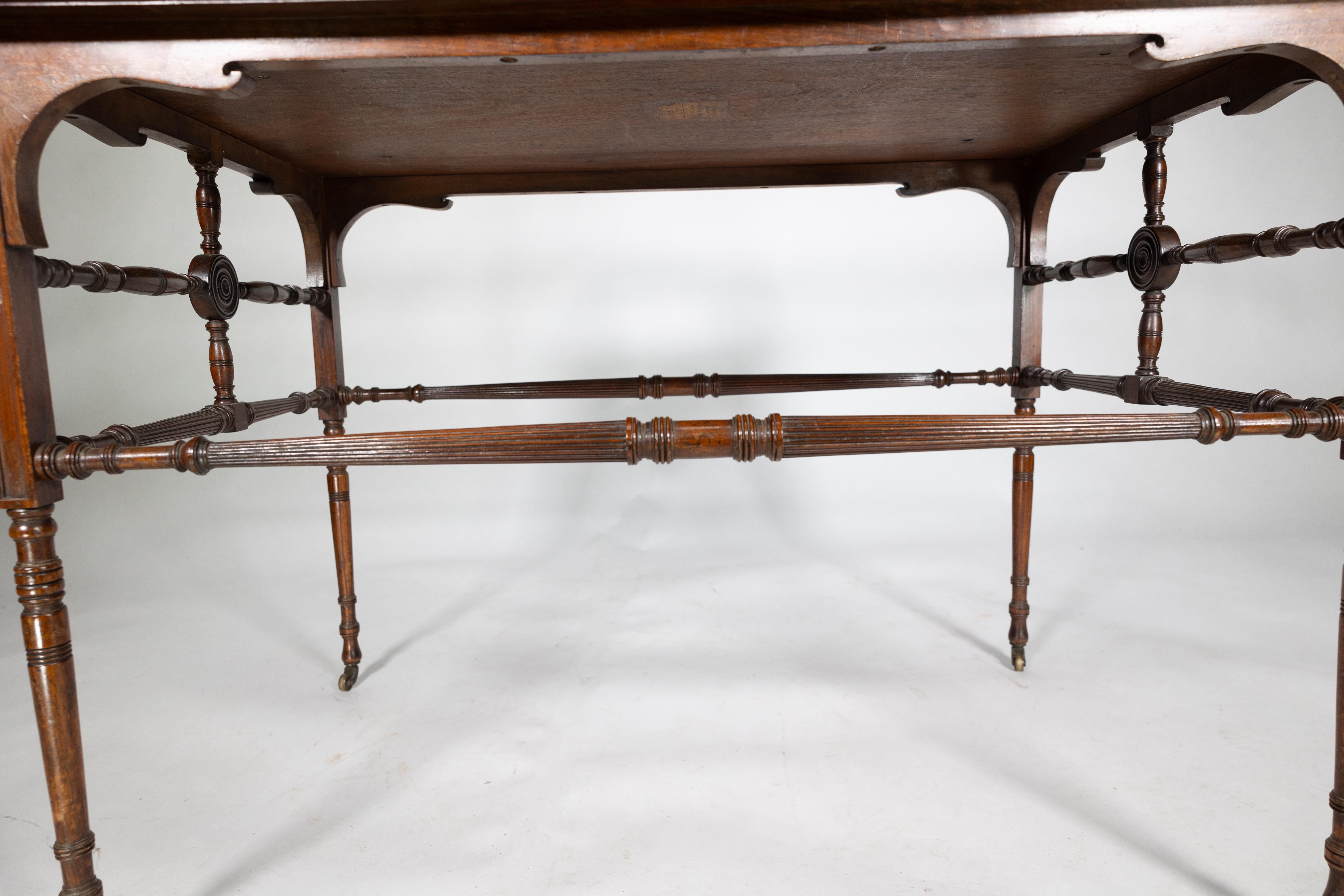 Howard and Sons. A high art Aesthetic Movement Walnut centre tea table For Sale 11