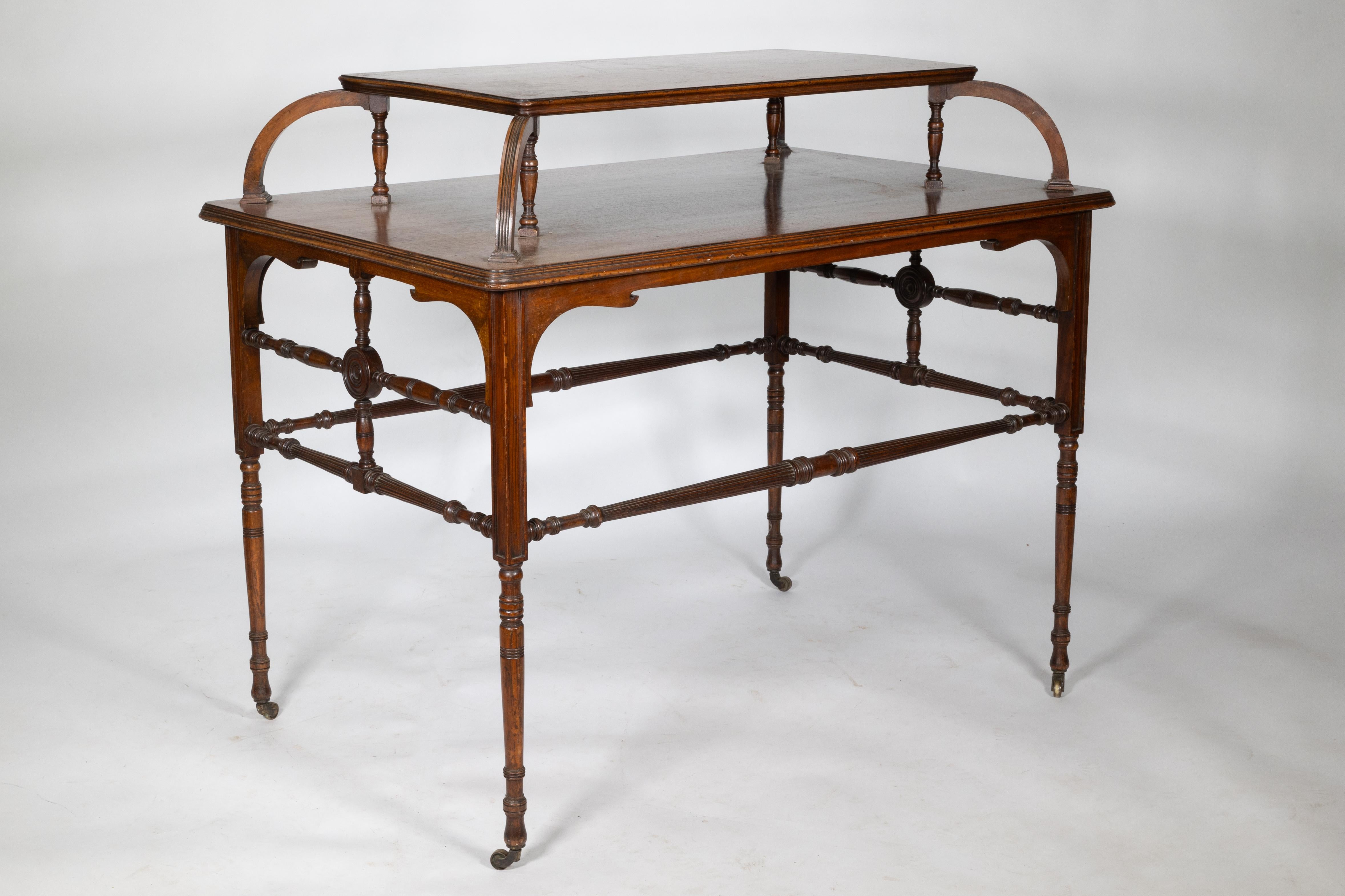 English Howard and Sons. A high art Aesthetic Movement Walnut centre tea table For Sale
