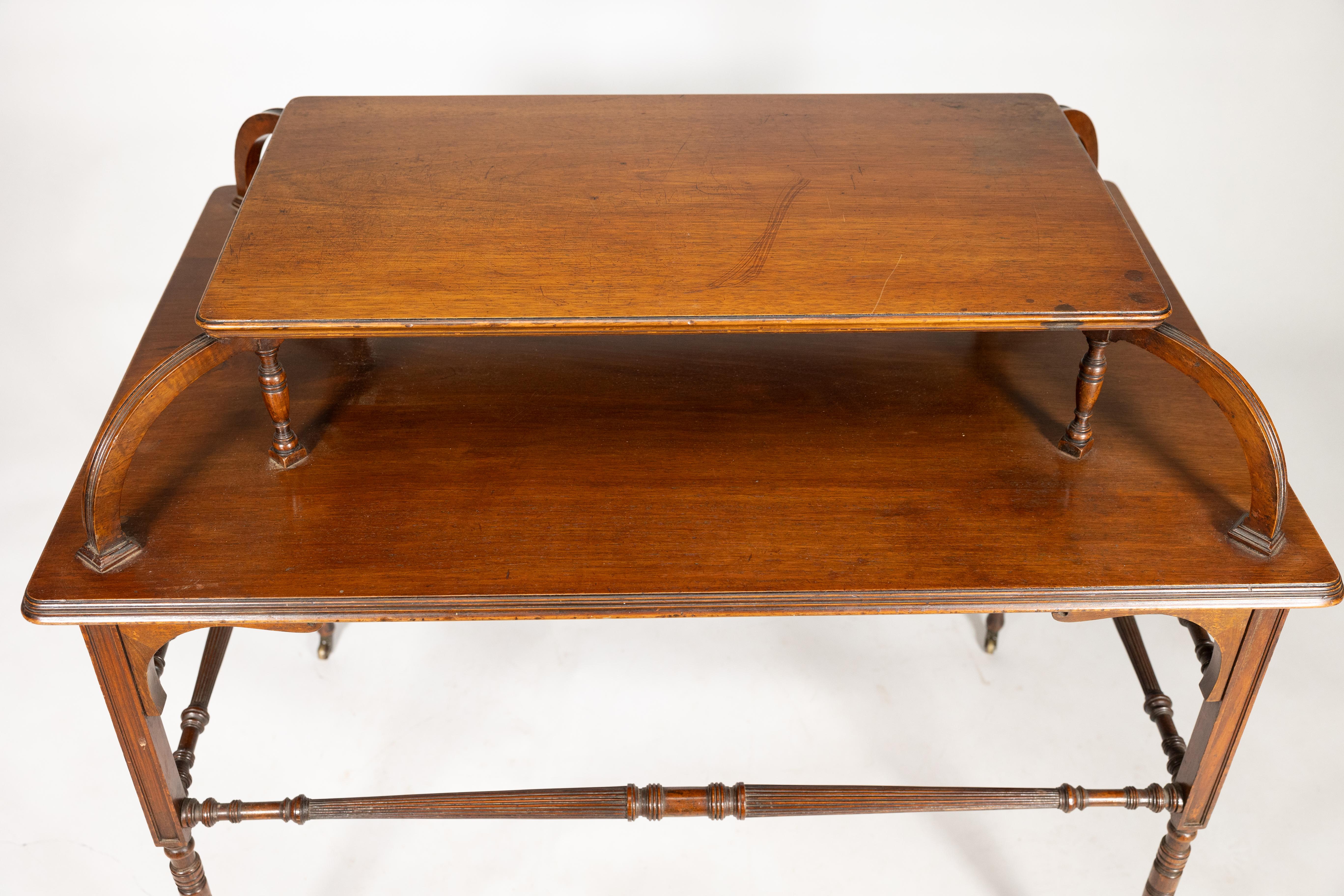 Howard and Sons. A high art Aesthetic Movement Walnut centre tea table For Sale 1