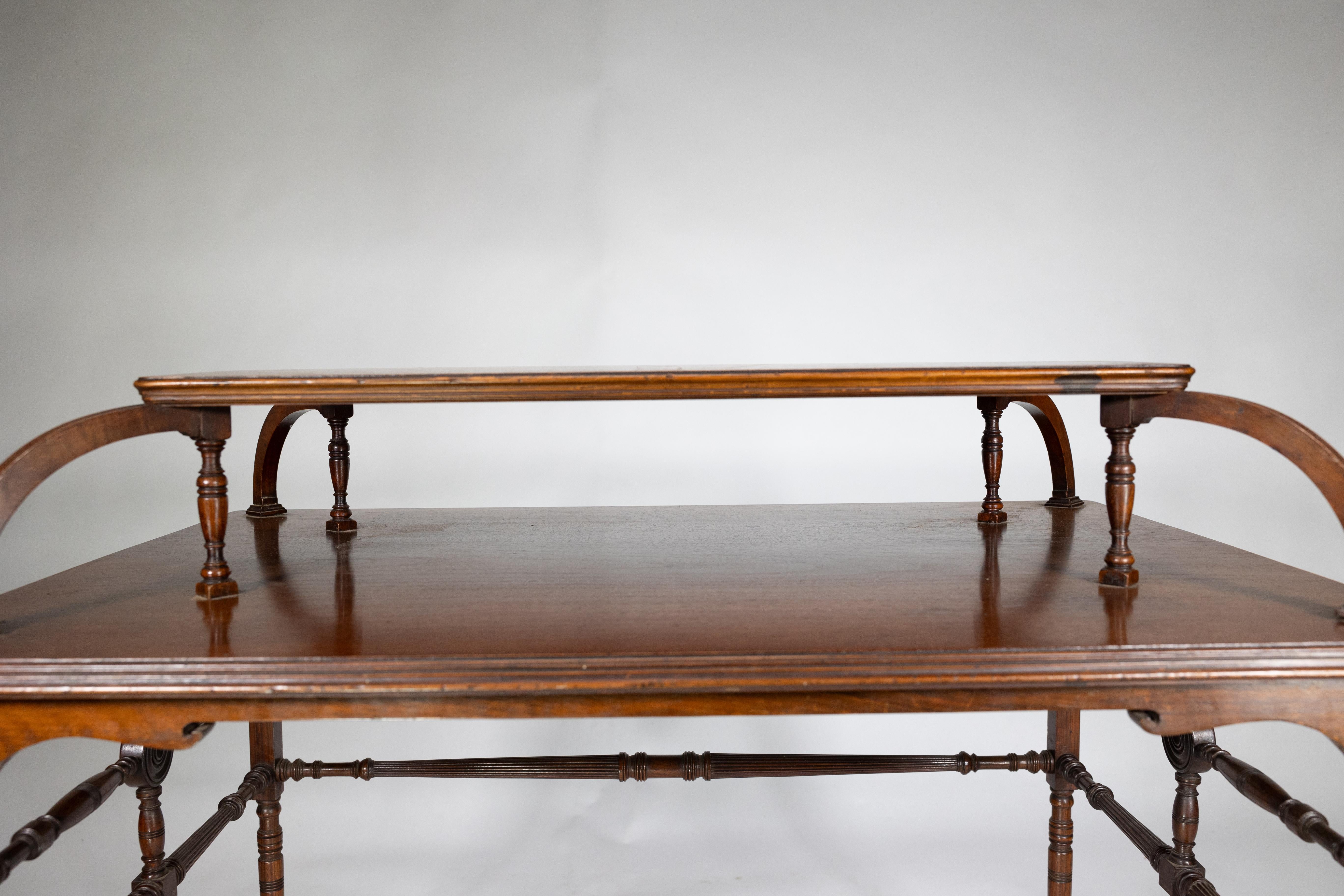 Howard and Sons. A high art Aesthetic Movement Walnut centre tea table For Sale 2