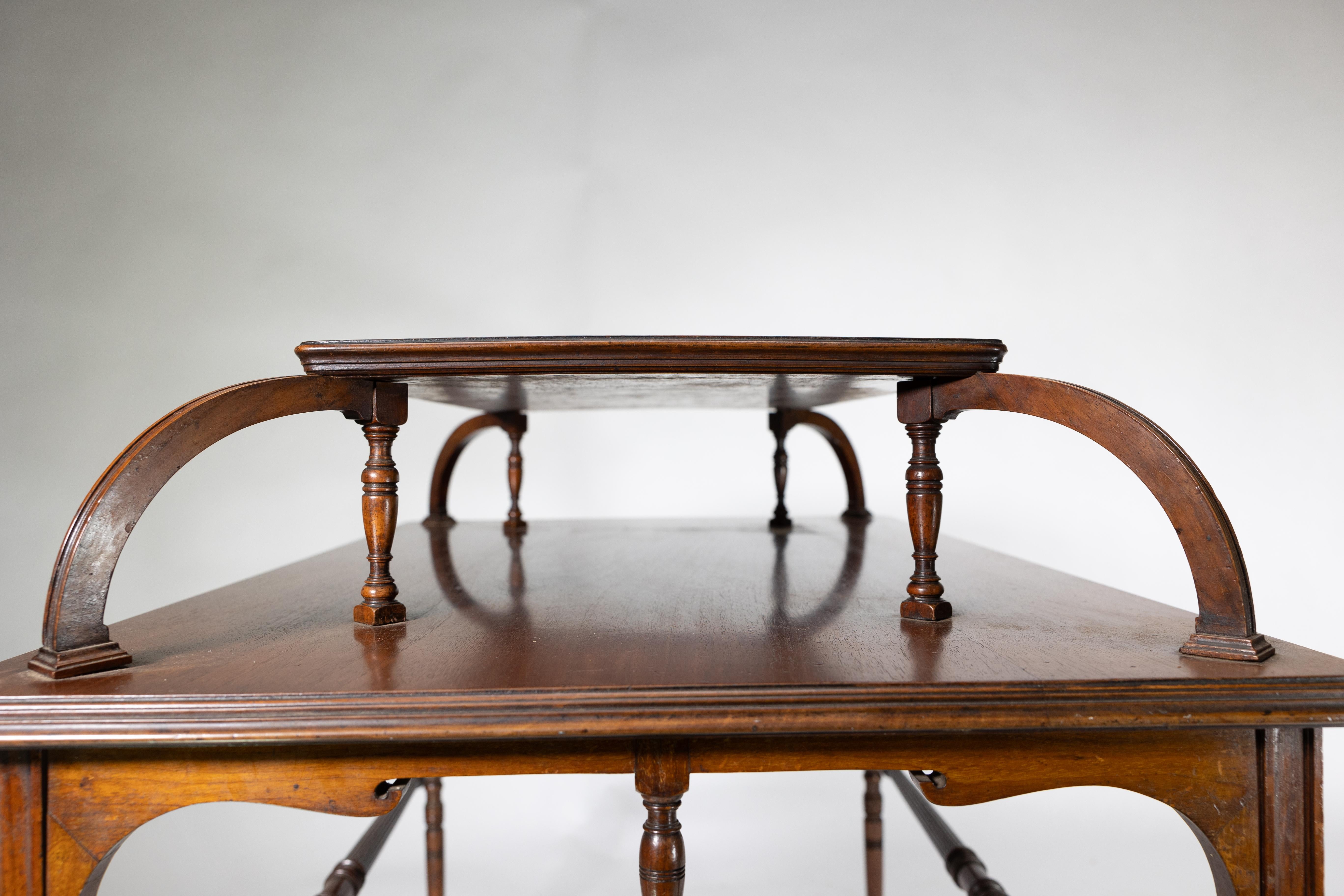 Howard and Sons. A high art Aesthetic Movement Walnut centre tea table For Sale 3