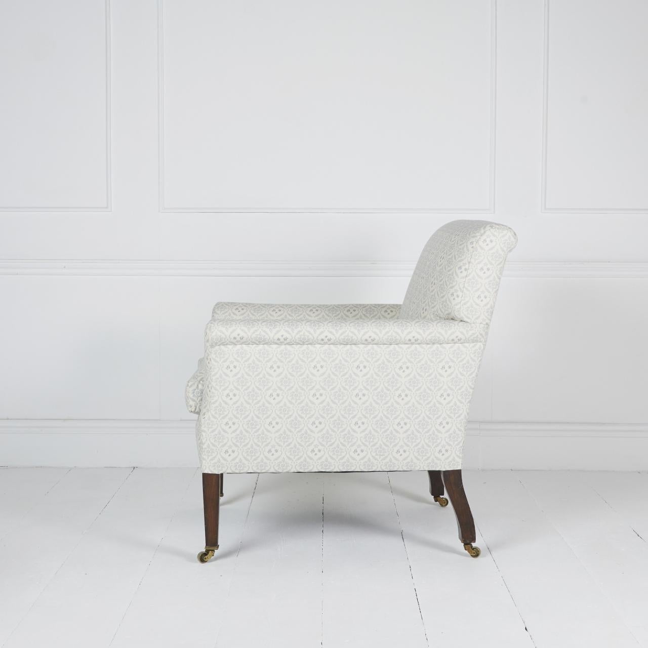 Hardwood Howard and sons antique English library chair For Sale
