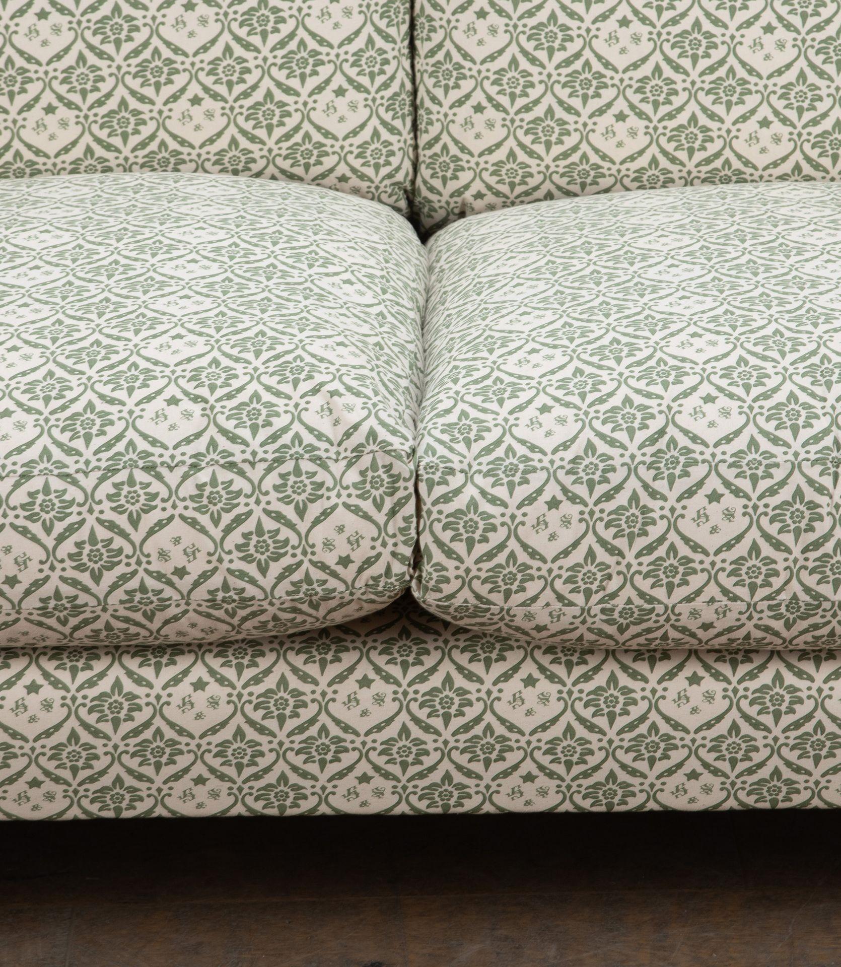 A Howard and Sons ‘Large Beckett’ sofa.
Raised on four large square tapering legs, one stamped ‘Howard and Sons Ltd London W1’ with typical Burlington St period serial number.
Recovered in replica green H&S monogram ticking fabric.
This is the large