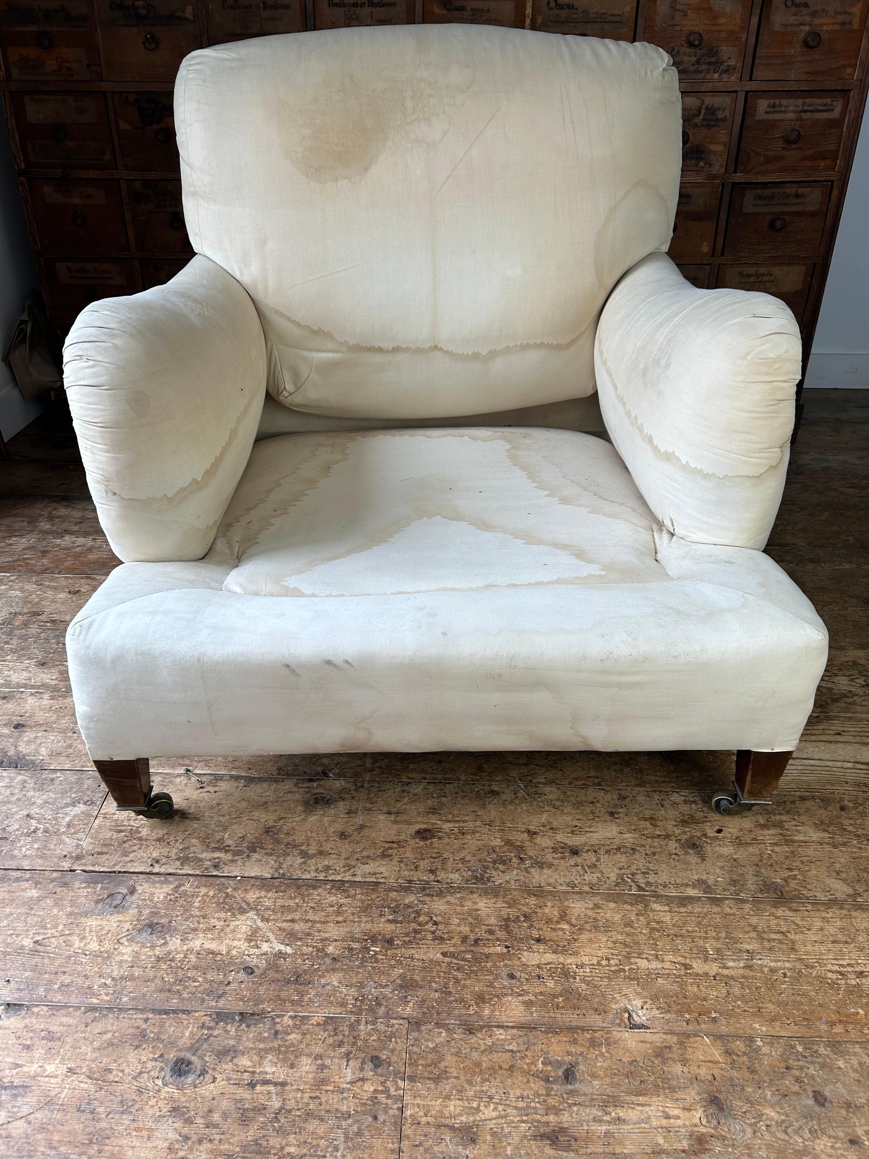 The Ivor model Howard and Sons armchair is the most rare and sort after, being of the most generous proportions. Retaining it’s original upholstery in the calico, it is reassuringly stamped on the back leg with two sets of numbers and Howard and