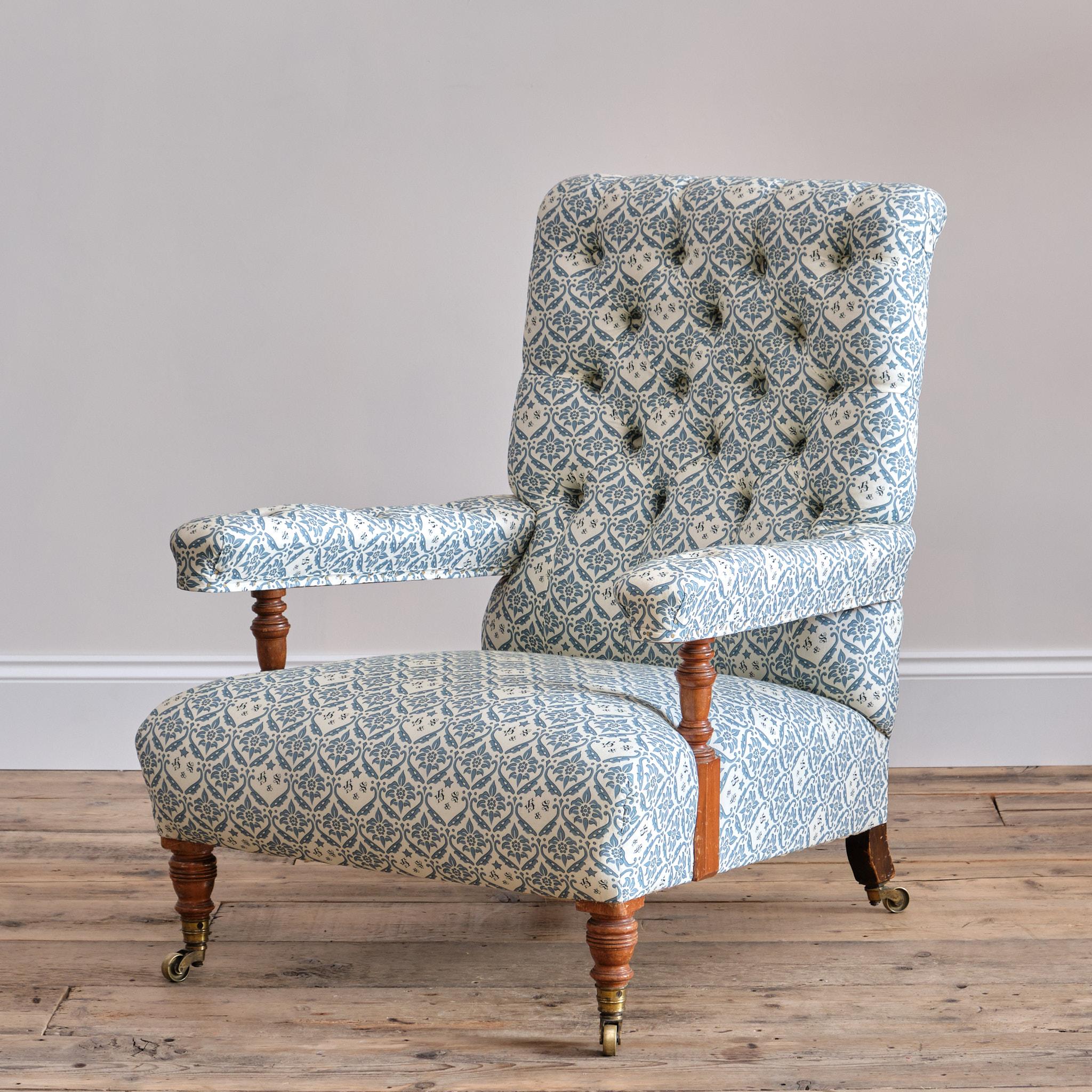 Edwardian Howard and sons open armchair