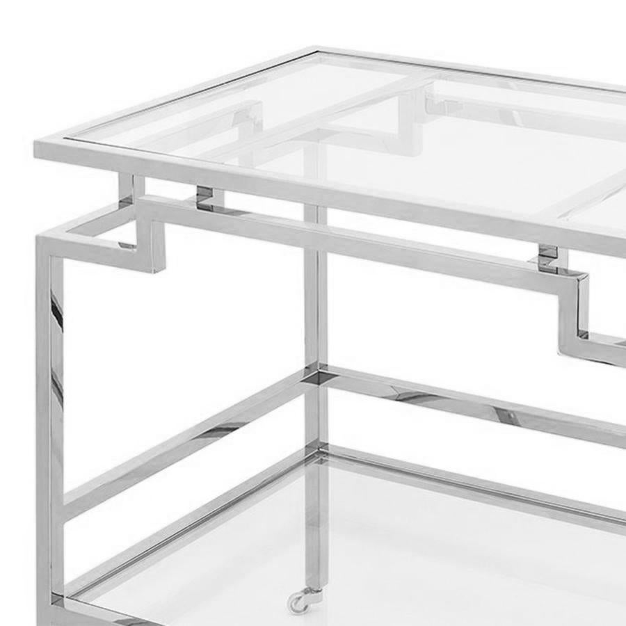 Trolley Howard Chrome bar carts, with steel structure in
chrome finish and with 2 bevelled clear glass tops. Trolley
with rotting casters.