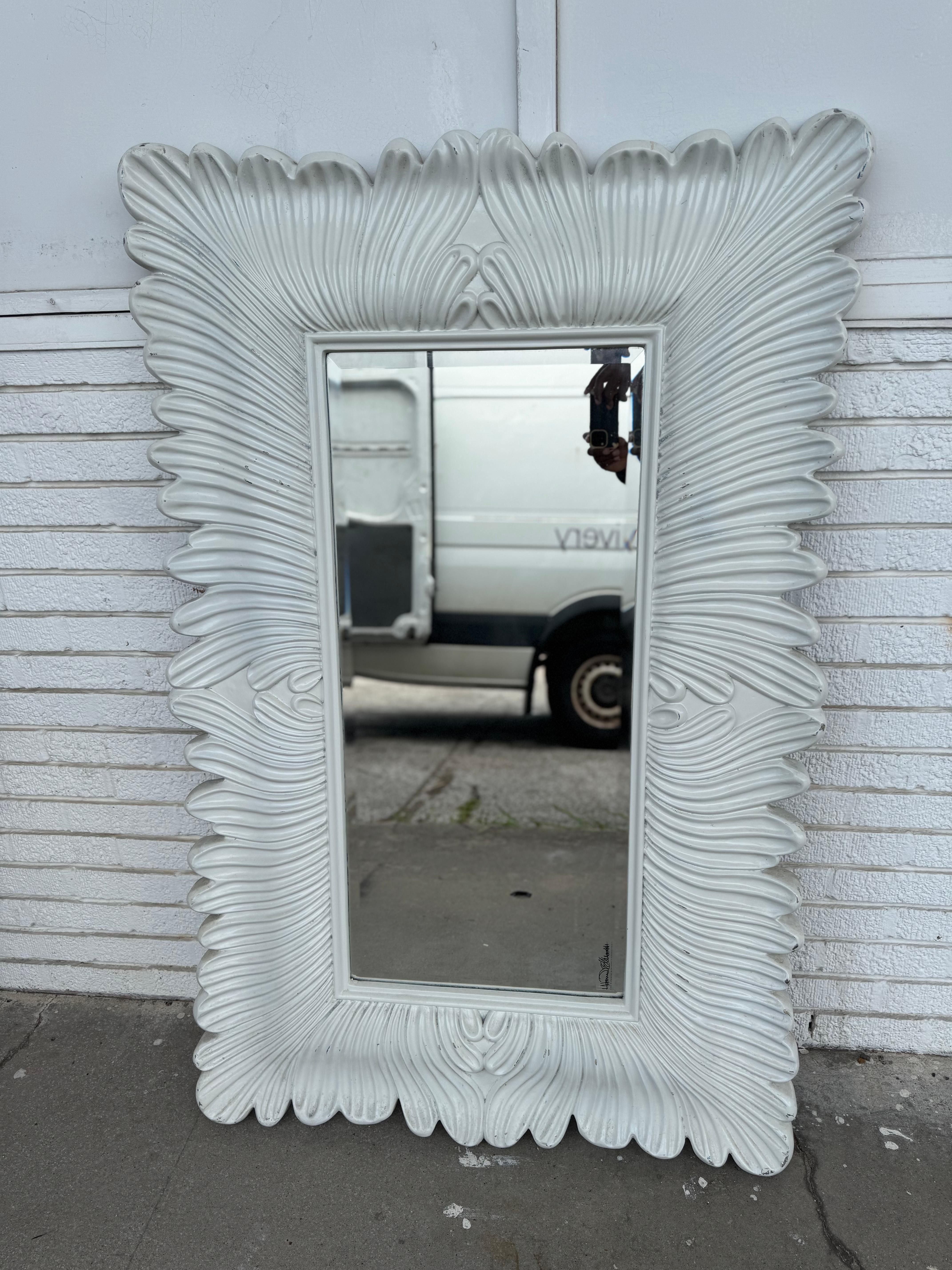 Howard Elliott makes some of the finest quality mirrors today.
This one is cast in a coral type shape.
The frame color can be changed.
Labeled Howard Elliott.