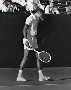 Arthur Ashe en acción