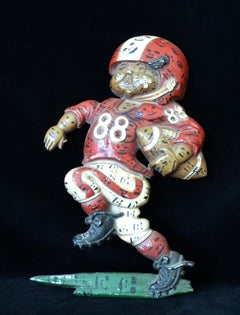 Colgante metálico de pared "Jugador de fútbol americano de la UGA" firmado por Howard Finster, 1992