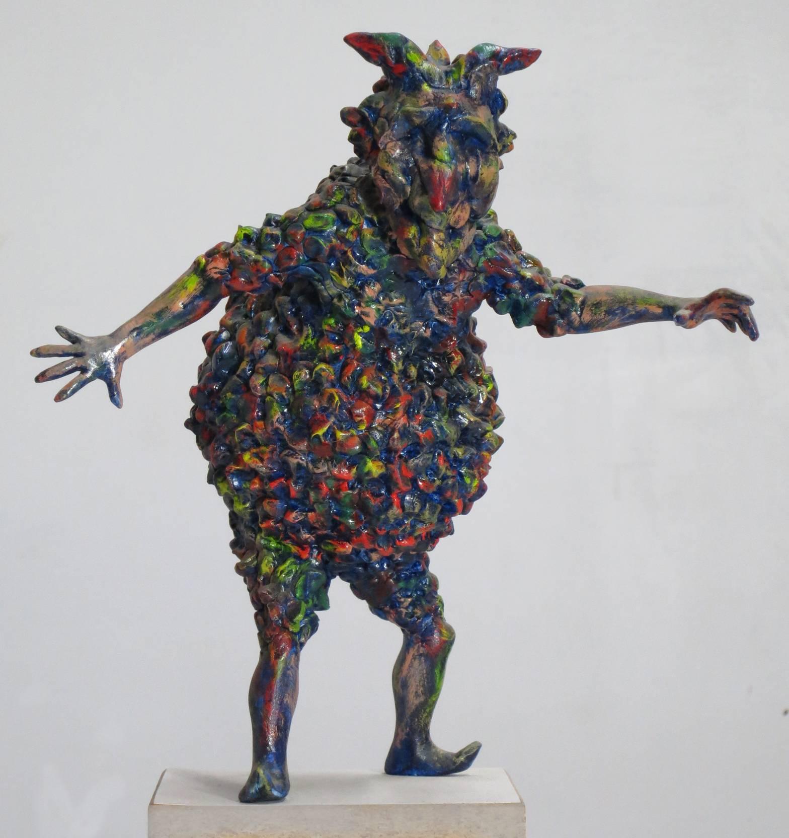 Howard Kalish Figurative Sculpture - “Small Rigoletto”, jester of Verdi opera, romps in reds, blues, and greens