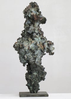 "Smoker", intricately carved, textured tabletop bronze with a blue green patina