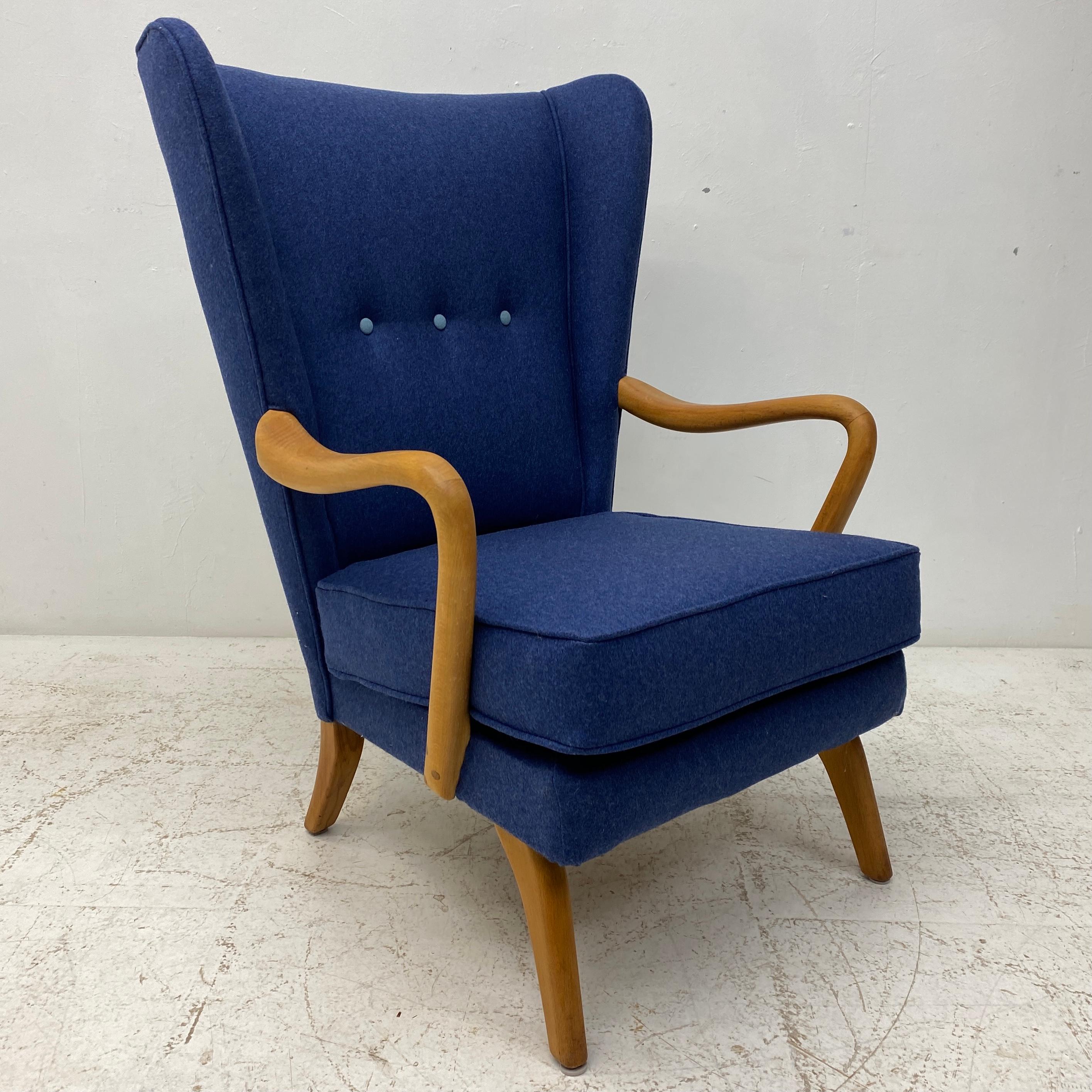 This Howard Keith “Bambino” armchair is a piece of history from the British midcentury company, HK Furniture. Howard Keith was among the British designers to pioneer the use of new materials and manufacturing techniques, whilst maintaining links