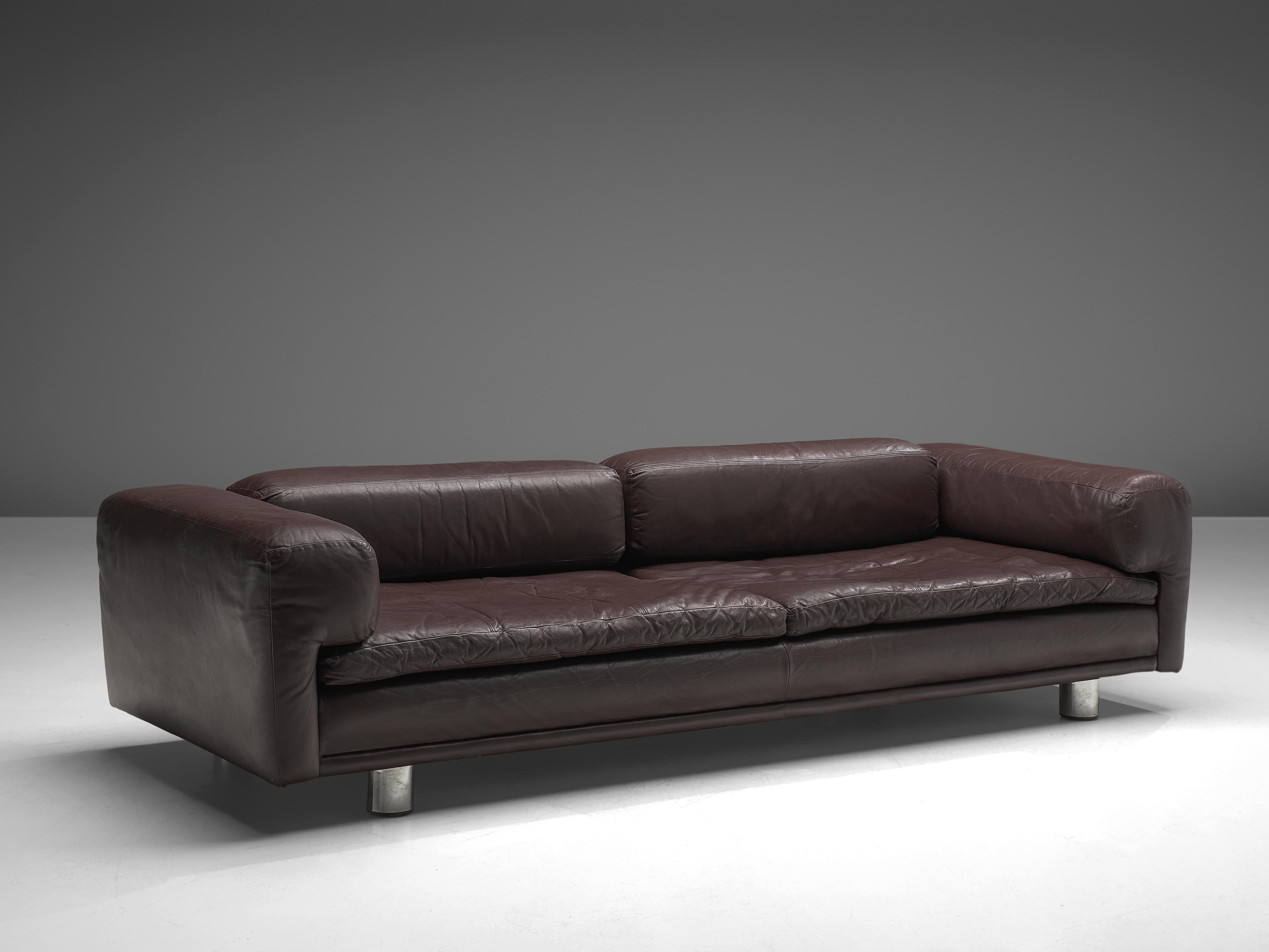 Howard Keith for HK Furniture, 'Diplomat' sofa, brown leather, metal, United Kingdom, 1970s

Grand voluptuous sofa by Howard Keith designed in the 1970s. This sofa with a deep seat is a true delight to sit and relax in. The thick armrests, seat