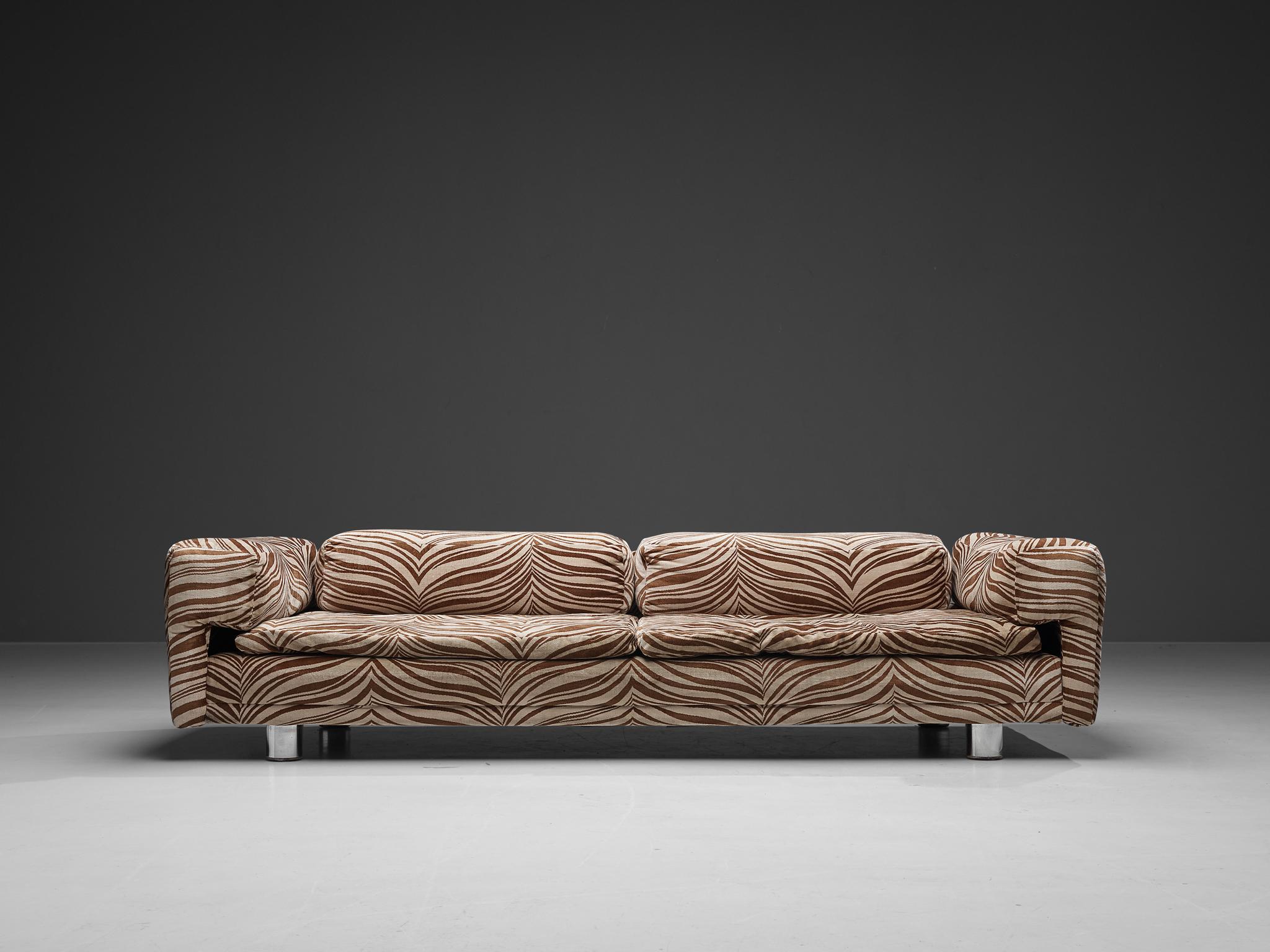 Howard Keith for HK Furniture, 'Diplomat' sofa, fabric, chrome-plated steel, United Kingdom, 1970s

This grand voluptuous ‘Diplomat’ sofa finds itself at the intersection of art and design. The exceptional and unique upholstery is executed in