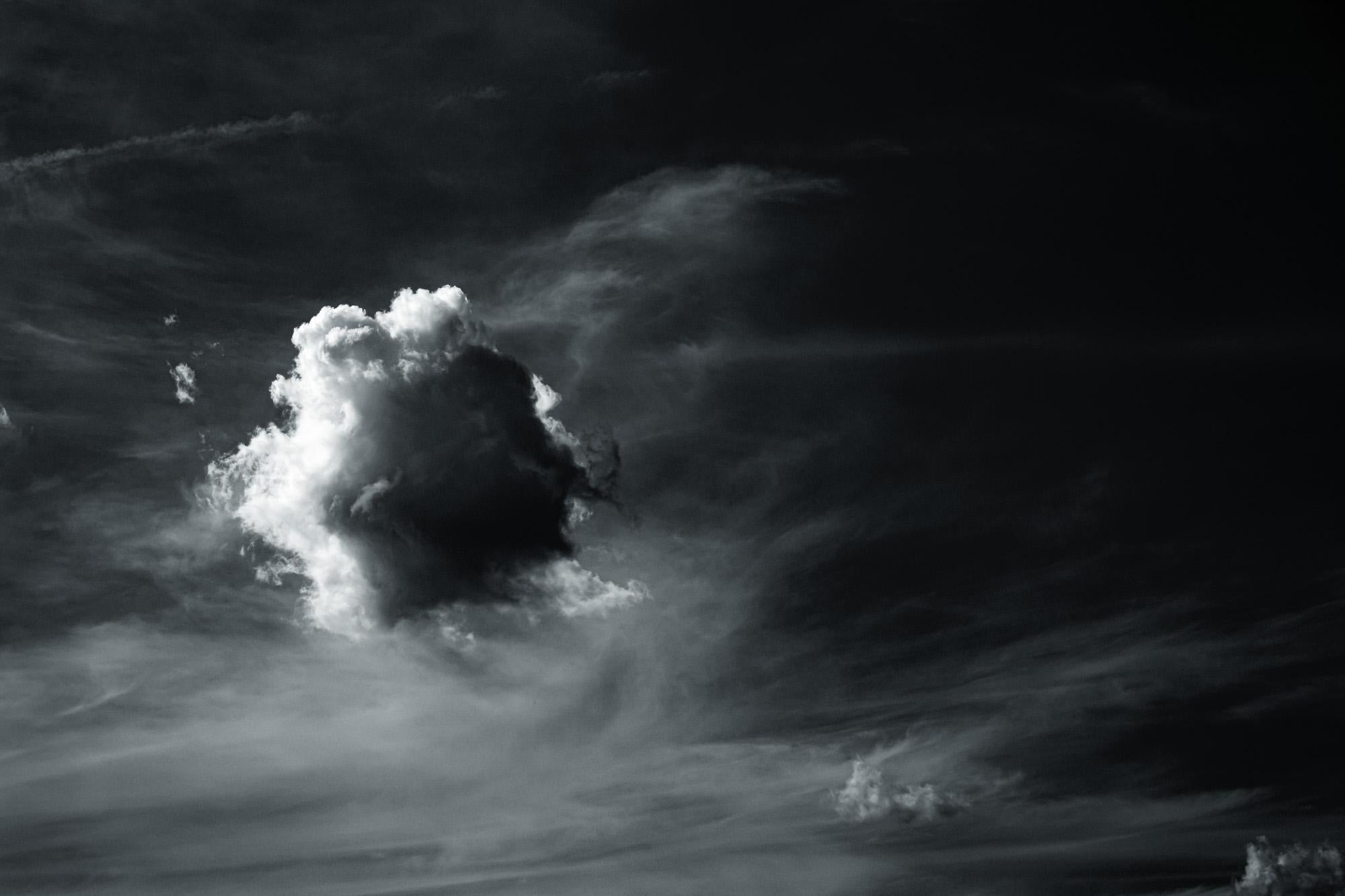 
Limited Edition Black and White Photograph Clouds and Light. This is image is "Light Push" from the Aerials series.

I’ve long been fascinated by weather and most recently climate change science. My deepening knowledge of climate change has