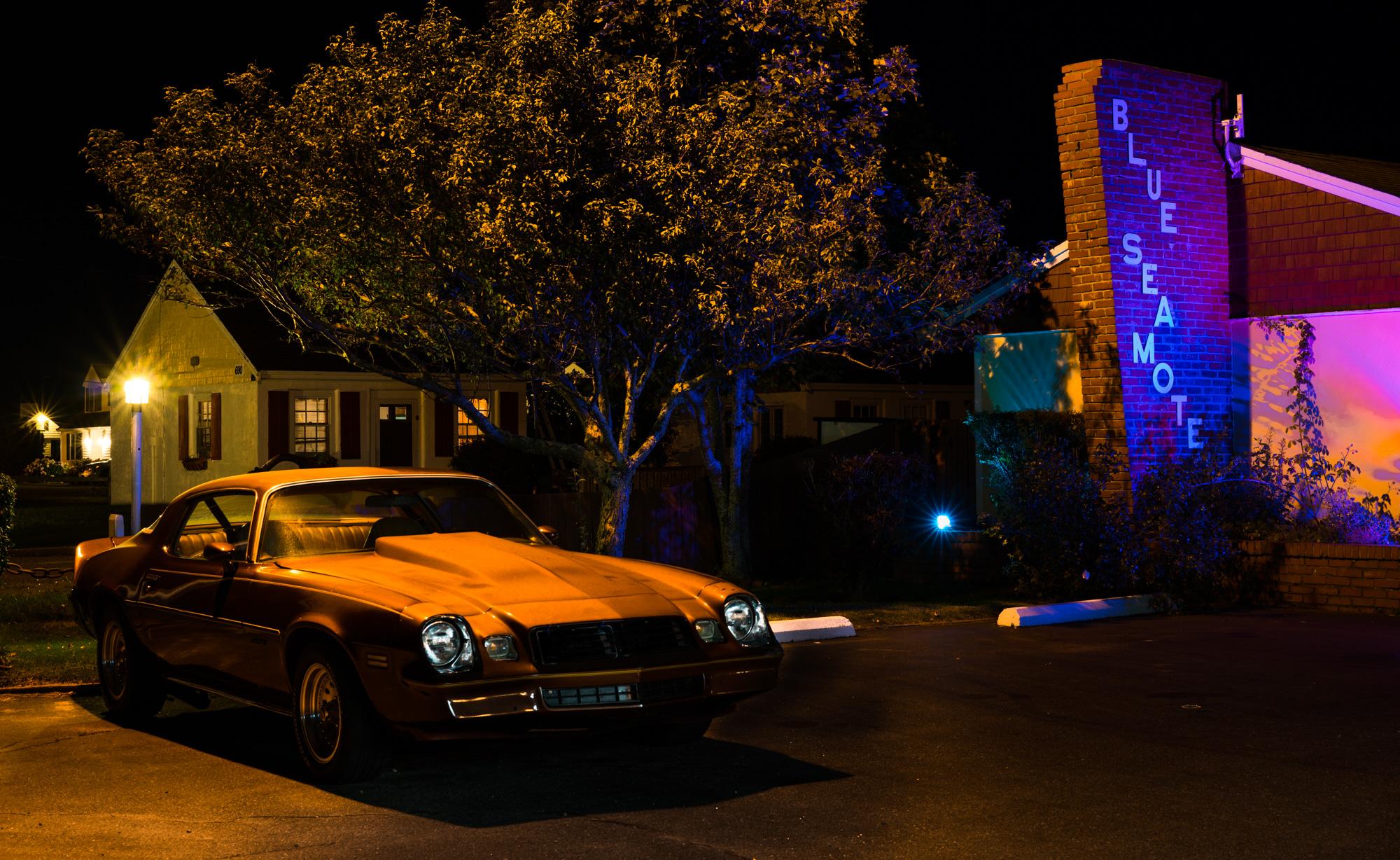 Howard Lewis Landscape Photograph -  Limited Edition Color Photograph - Car, Camaro, Hotel, Night