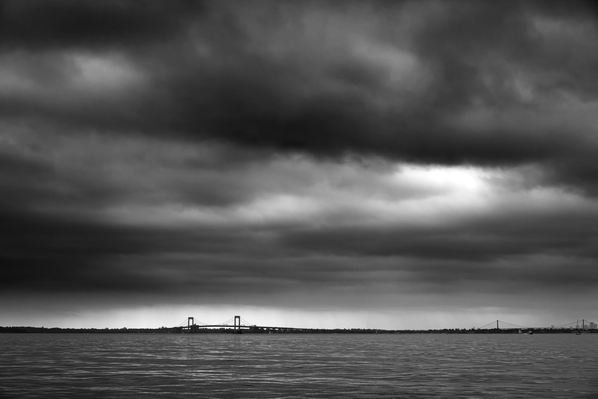 Limited Edition Black and White Photograph " Throgs Neck Bridge " 2020 I spent many hours on the water, kayaking, sailing, motoring, fishing and having fun.  It's a fine line between dangerous conditions and the right time to photograph. This image