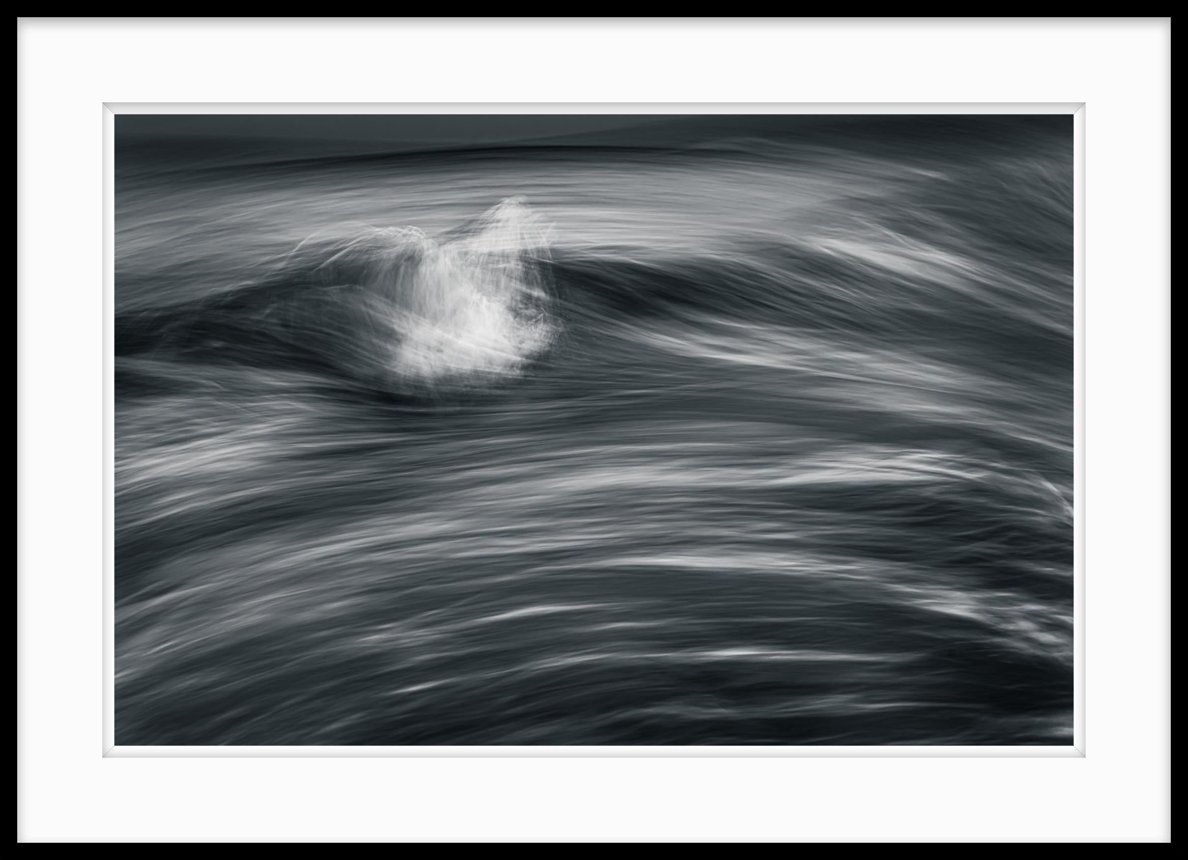 This is #96 from the Kinetic Solitude series. The series has been shown in the Dow Museum of Fine Arts as part of a exhibition that explored variations on the theme of water.

My photographic series “Kinetic Solitude” seeks to create visual imagery