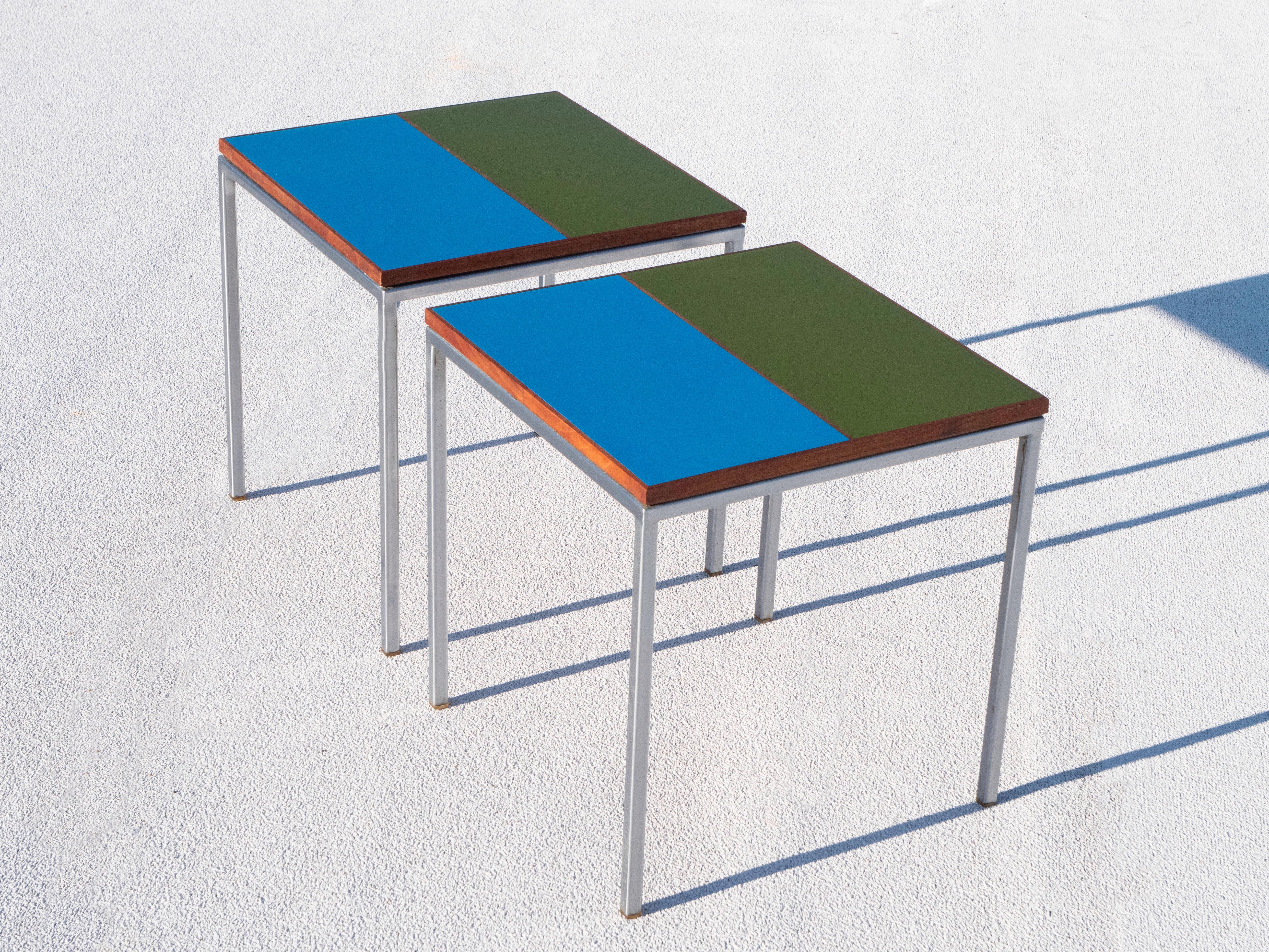 Pair of matching side tables by design team, Howard McNab & Don Savage for California based company Peter Pepper Products.  Design dated 1961.  The tables are in excellent original condition, only showing light wear and patina.  The frame is made of