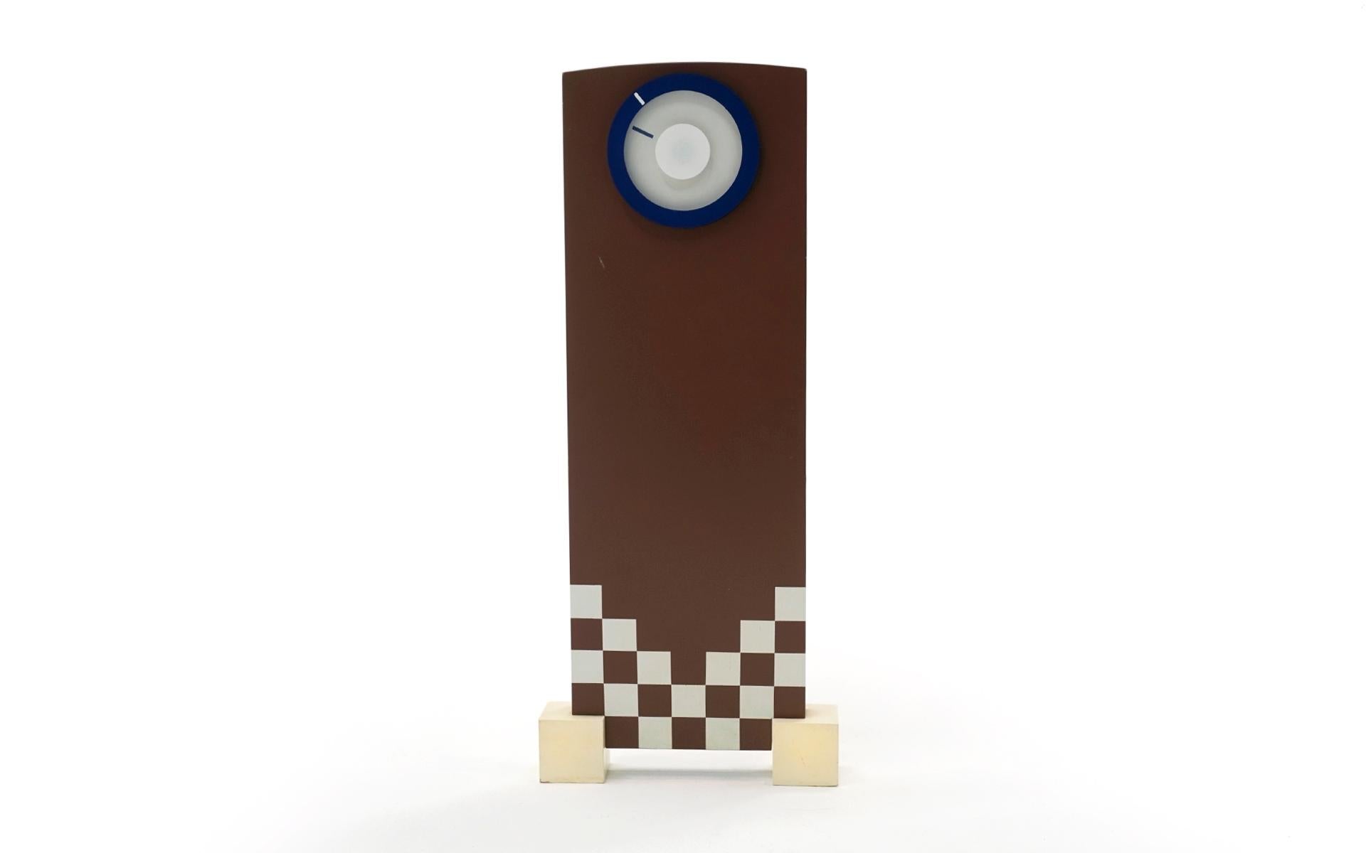 Rare postmodern brown and cream checkerboard table clock by Howard Miller Clock Company. From the 1984 