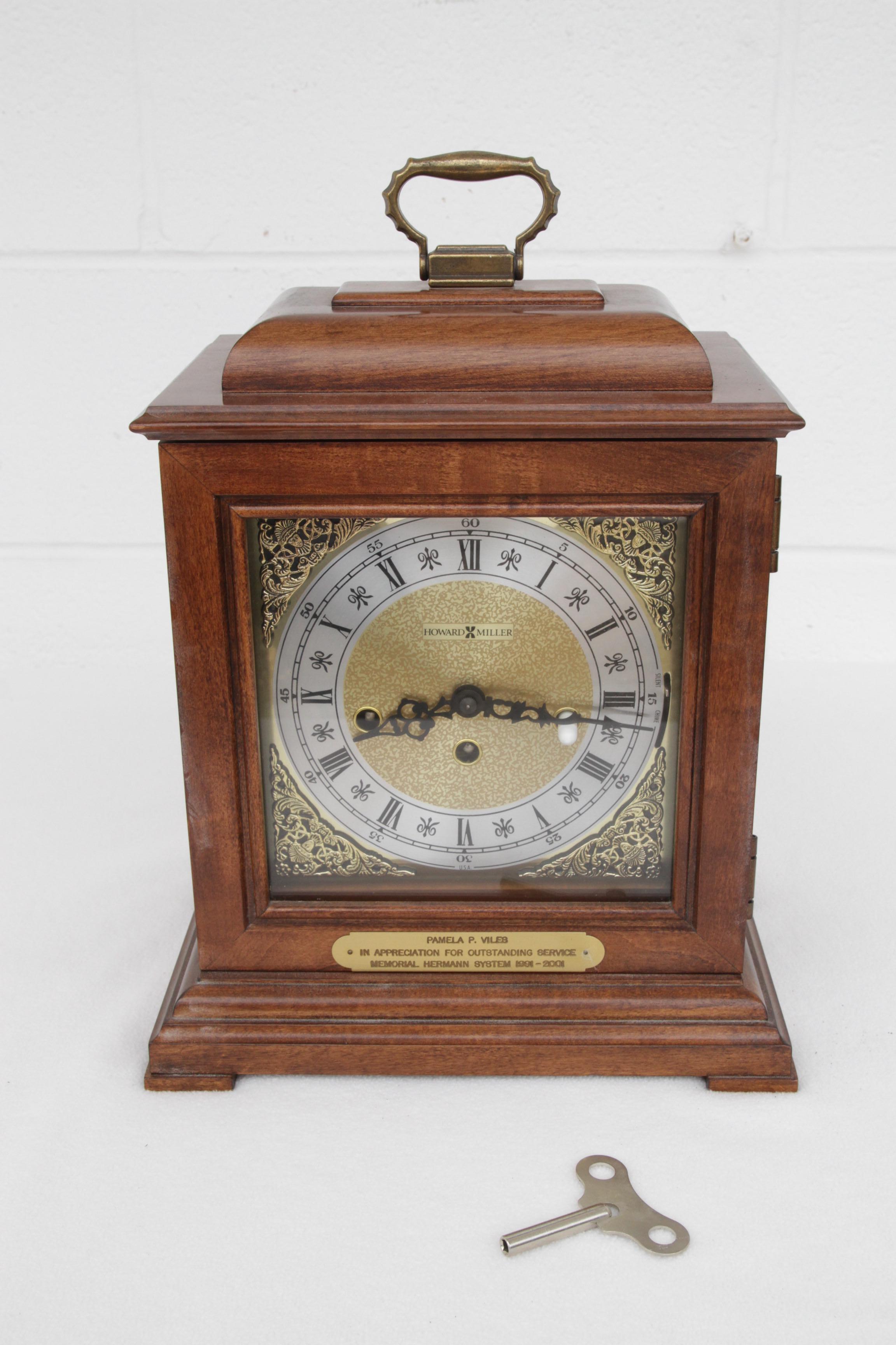 Finished in Windsor Cherry on select hardwoods and veneers.
Brass finished dial offers a silver chapter ring and decorative corner spandrels.
A high-precision, German-made, key-wound, Westminster chime movement plays 1/4, 1/2, and 3/4 chimes