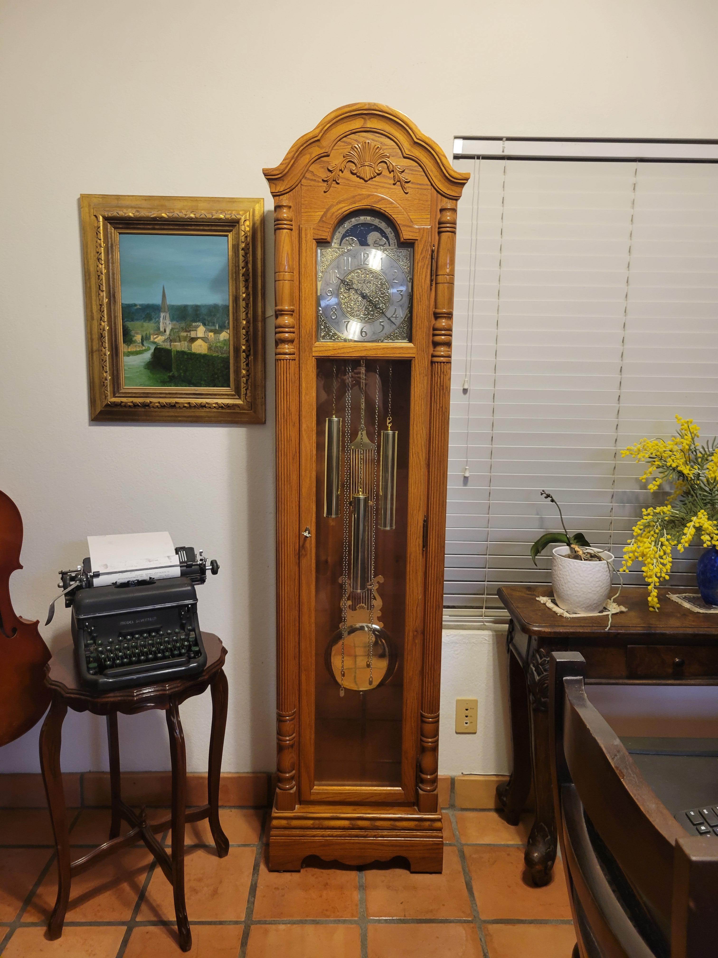 howard miller grandfather clock models