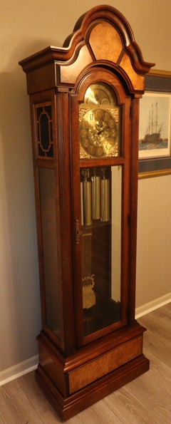 Howard MillerTriple-Chime Grandfather Clock — Burl Walnut Case