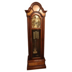 Howard MillerTriple-Chime Grandfather Clock — Burl Walnut Case