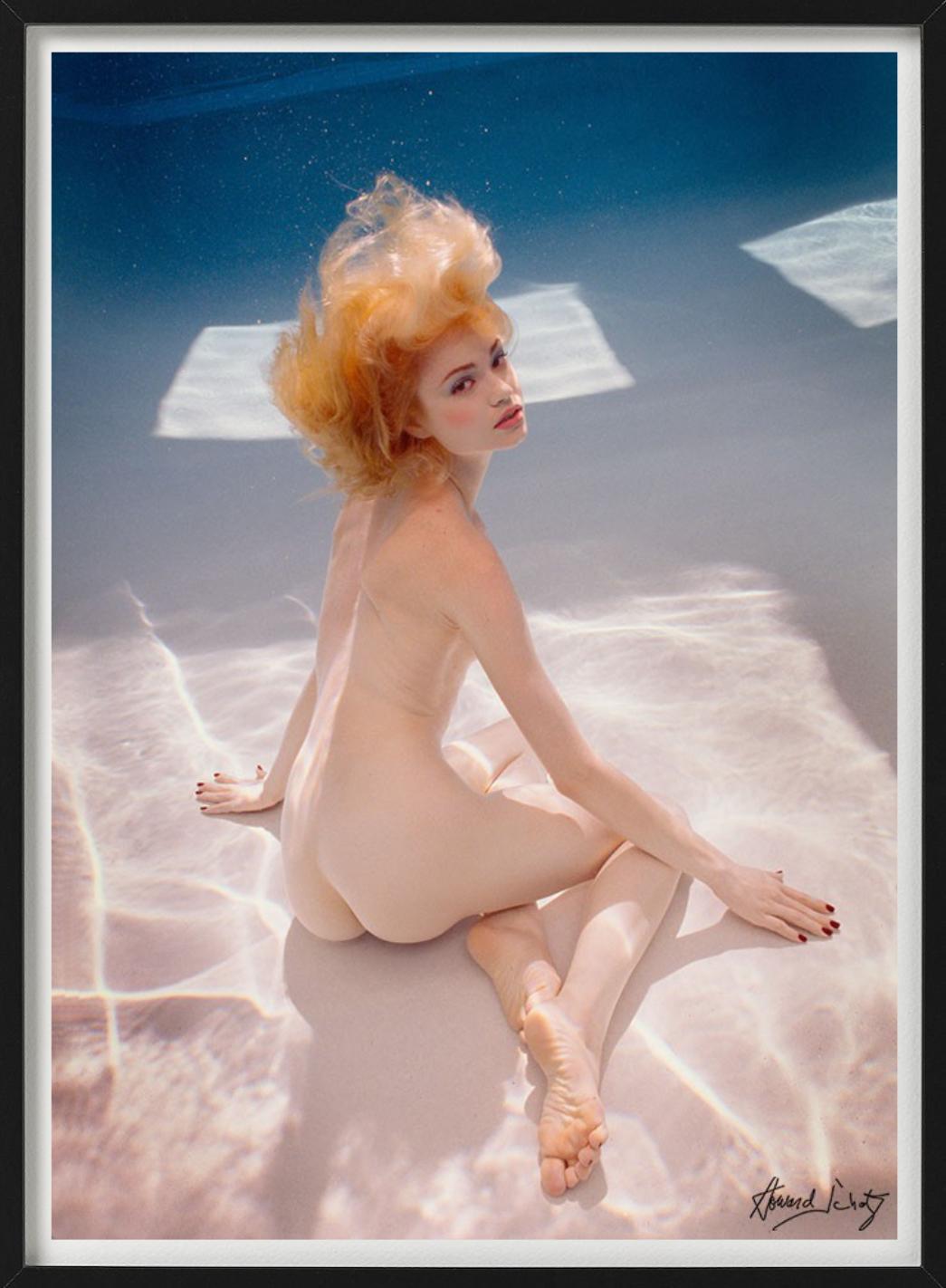 Shawnee sitting on the pool floor - nude underwater, fine art photography, 2018 - Photograph by Howard Schatz