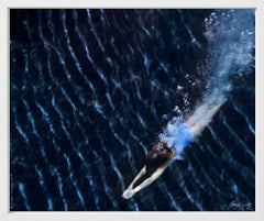 Underwater Study #3024 - model swimming in an ocean blue water