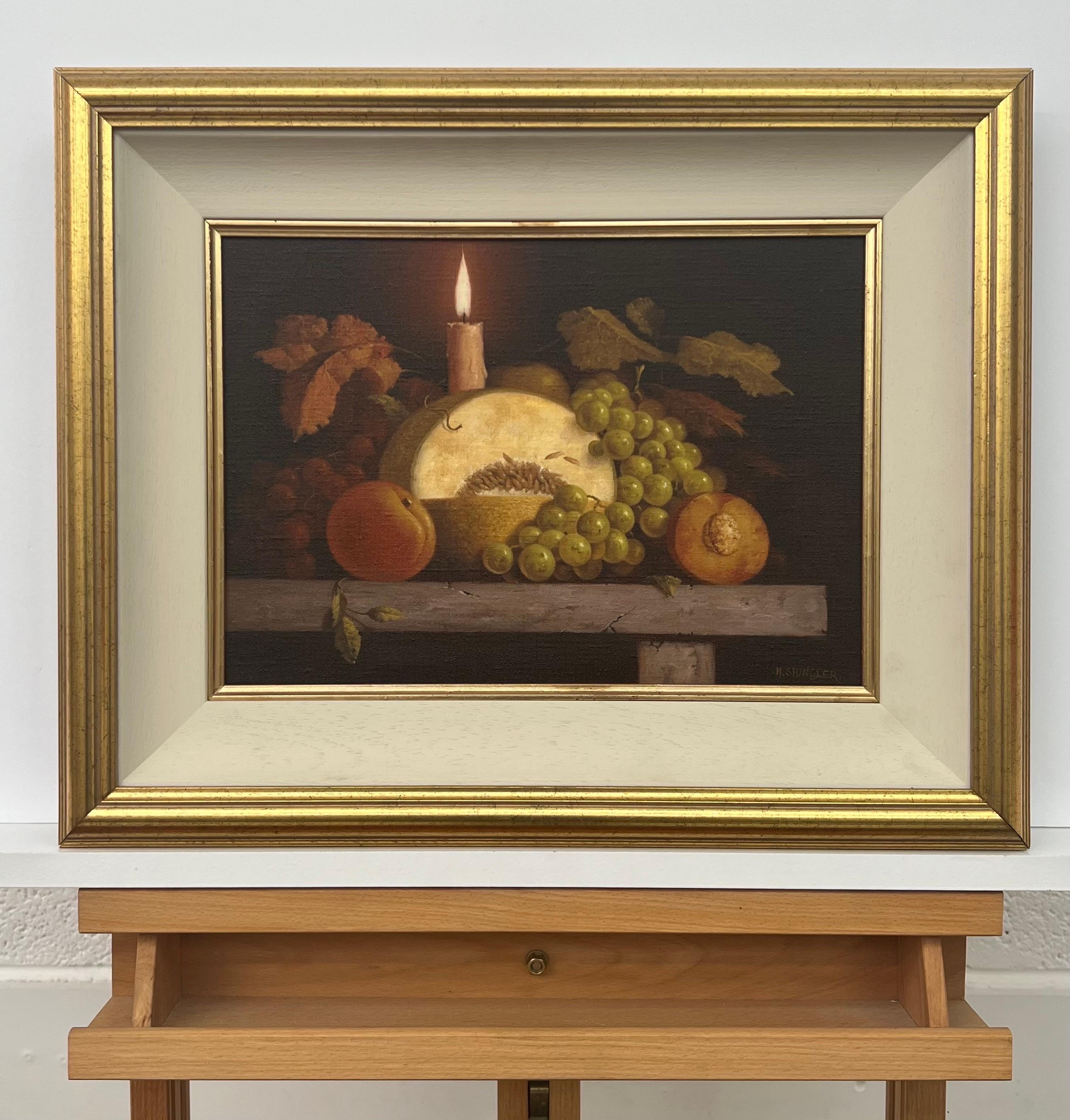 Traditional Interior Still Life Oil Painting with Fruit & Candle by 20th Century British Artist, Howard Shingler. This original has a lovely warm ambience and is presented in a gold frame with off-white insert.

Art measures 14 x 10 inches
Frame